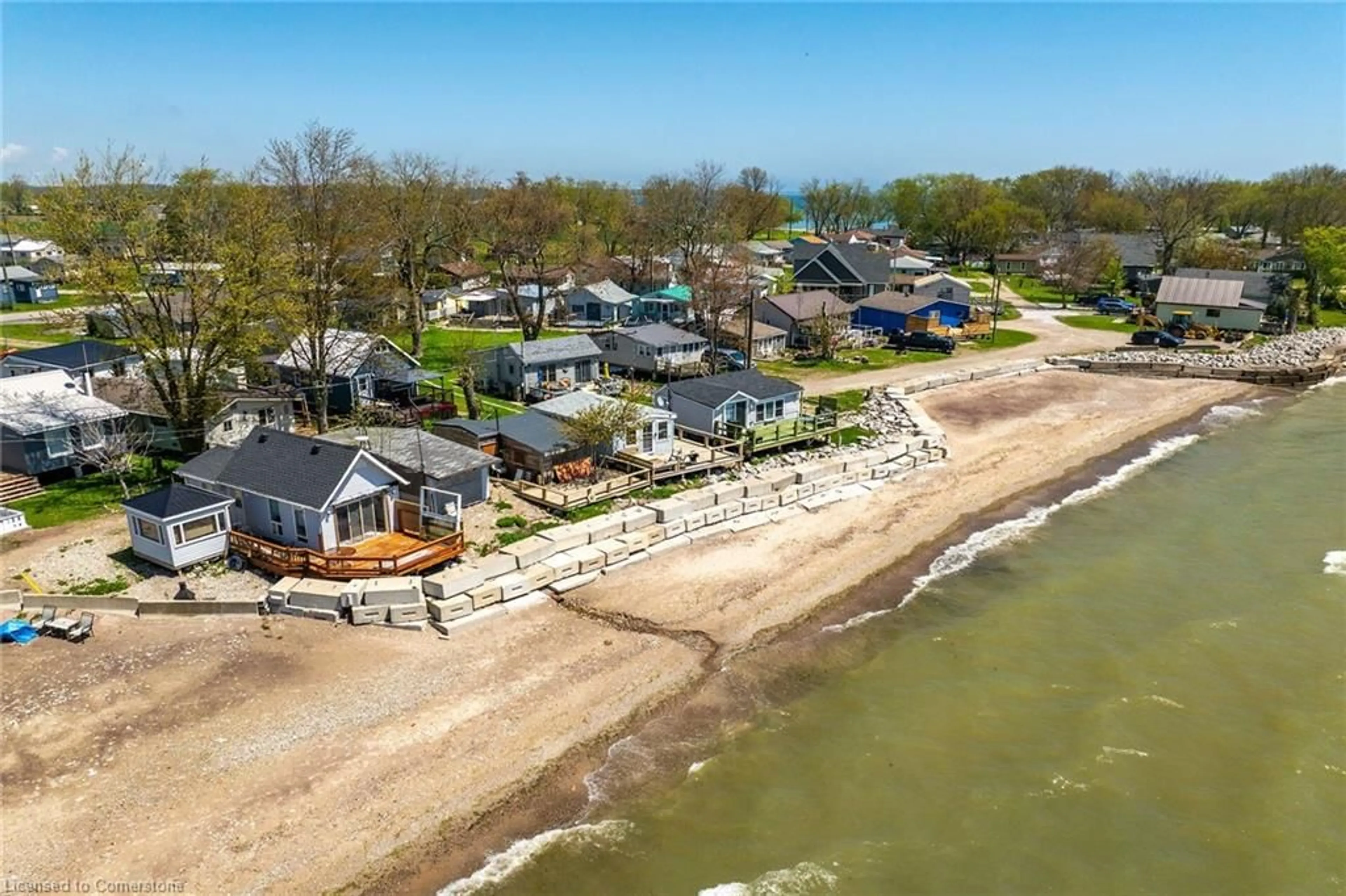 A pic from outside/outdoor area/front of a property/back of a property/a pic from drone, water/lake/river/ocean view for 24 Heather Lane, Featherstone Point Ontario N0A 1P0