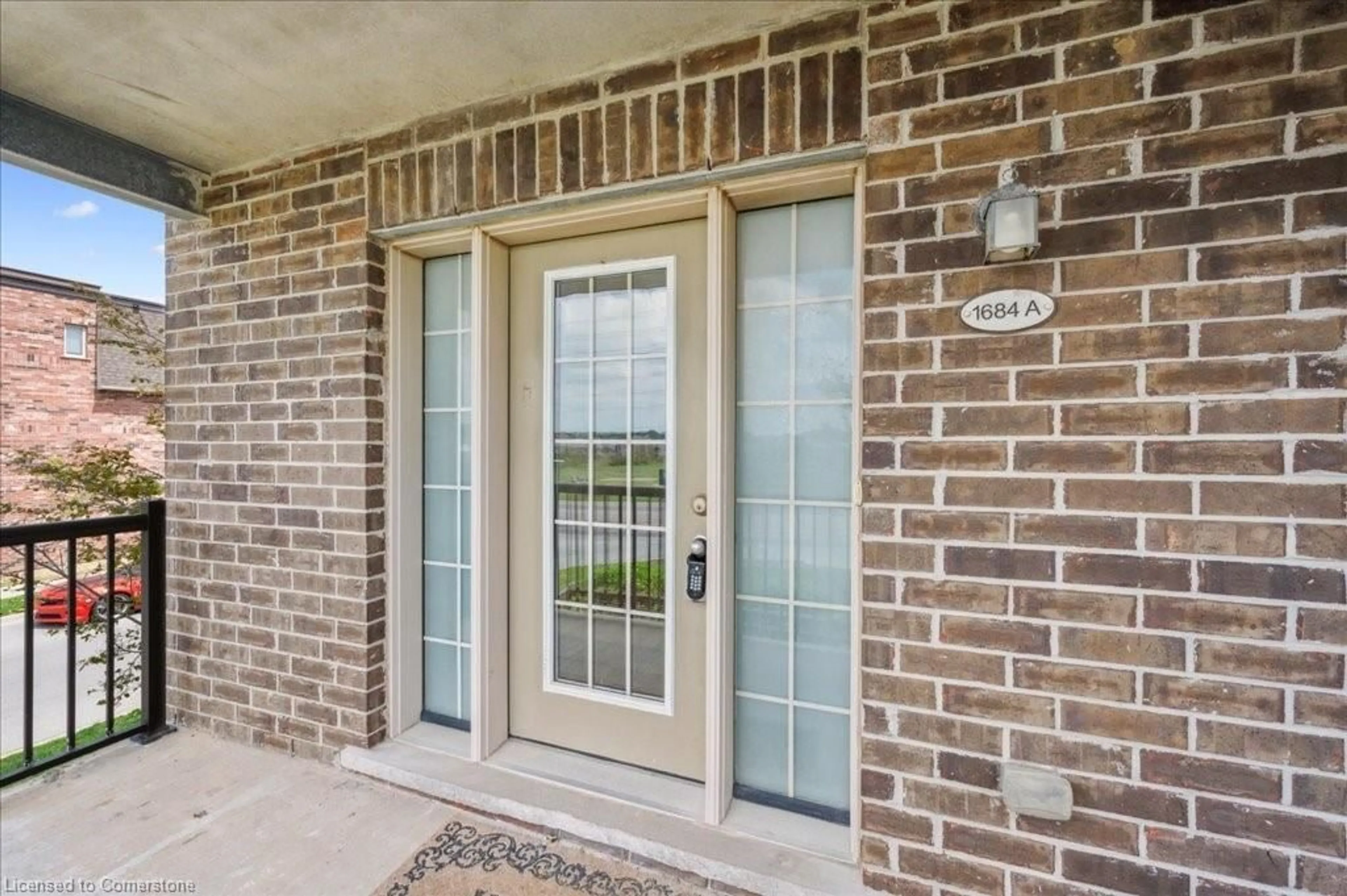 Home with brick exterior material, street for 1684 Fischer Hallman Rd #A, Kitchener Ontario N2R 1P7