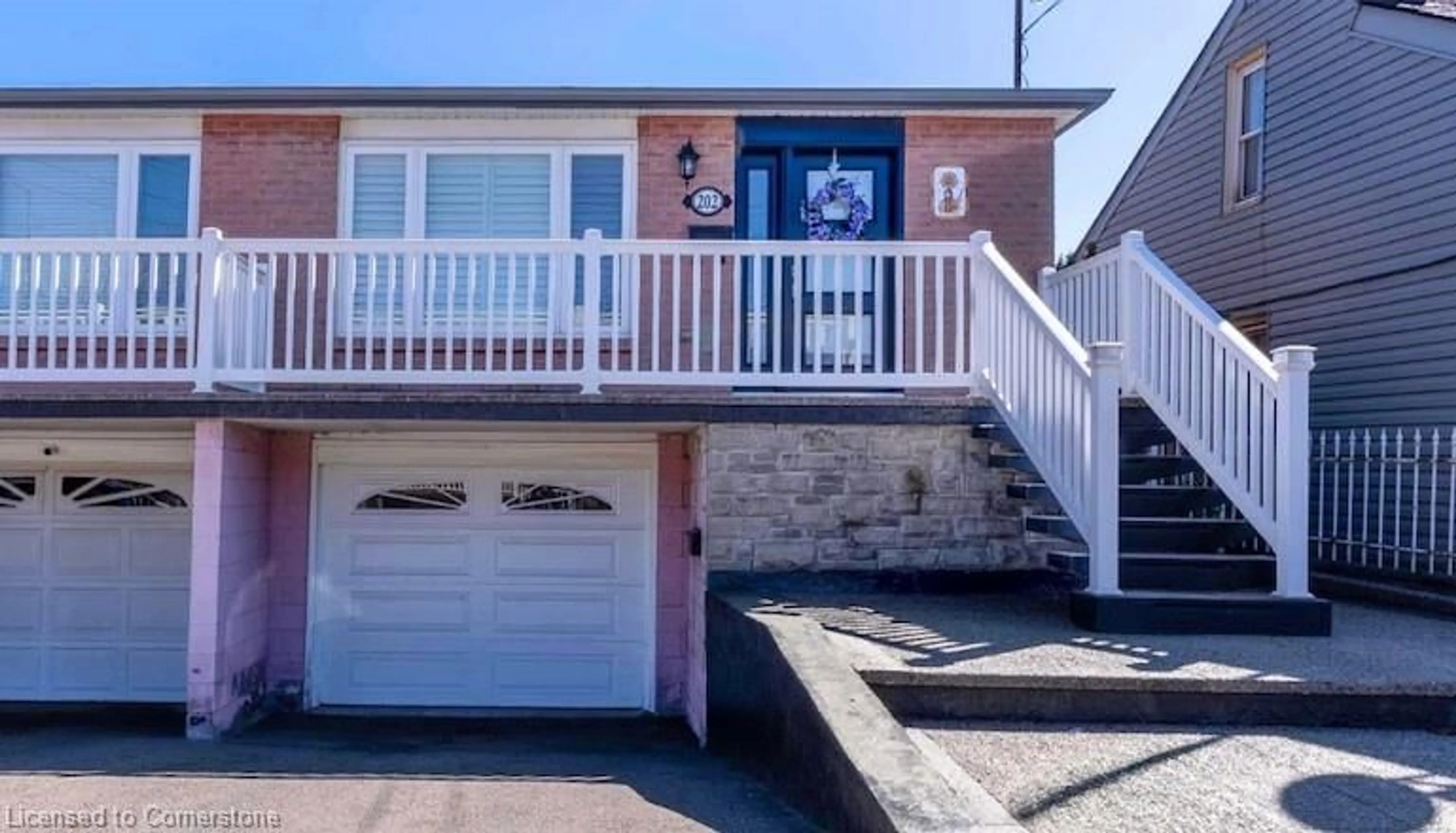 Home with vinyl exterior material, street for 202 Ray St, Hamilton Ontario L8R 2Y2