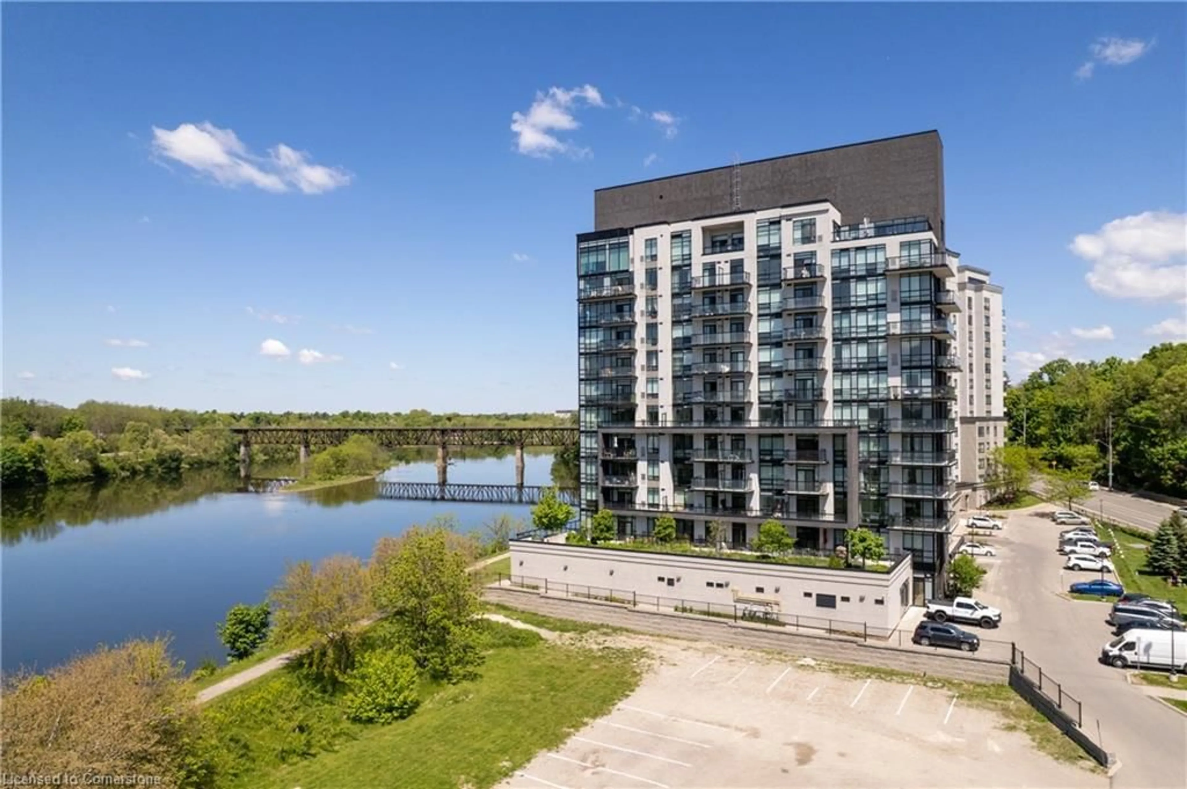 A pic from outside/outdoor area/front of a property/back of a property/a pic from drone, water/lake/river/ocean view for 150 Water St #407, Cambridge Ontario N1R 0B5