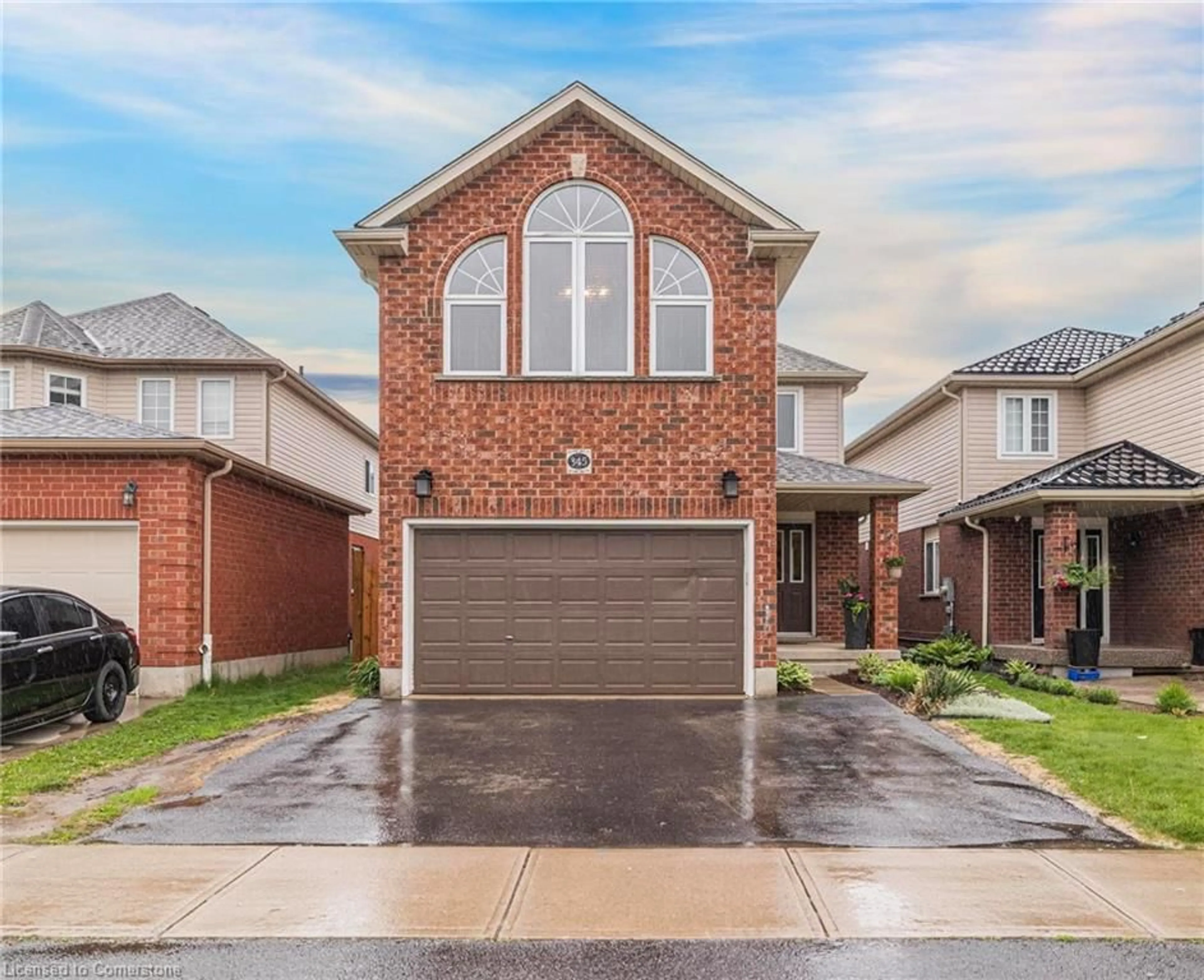 Home with brick exterior material, street for 345 Thomas Slee Dr, Kitchener Ontario N2P 2X5