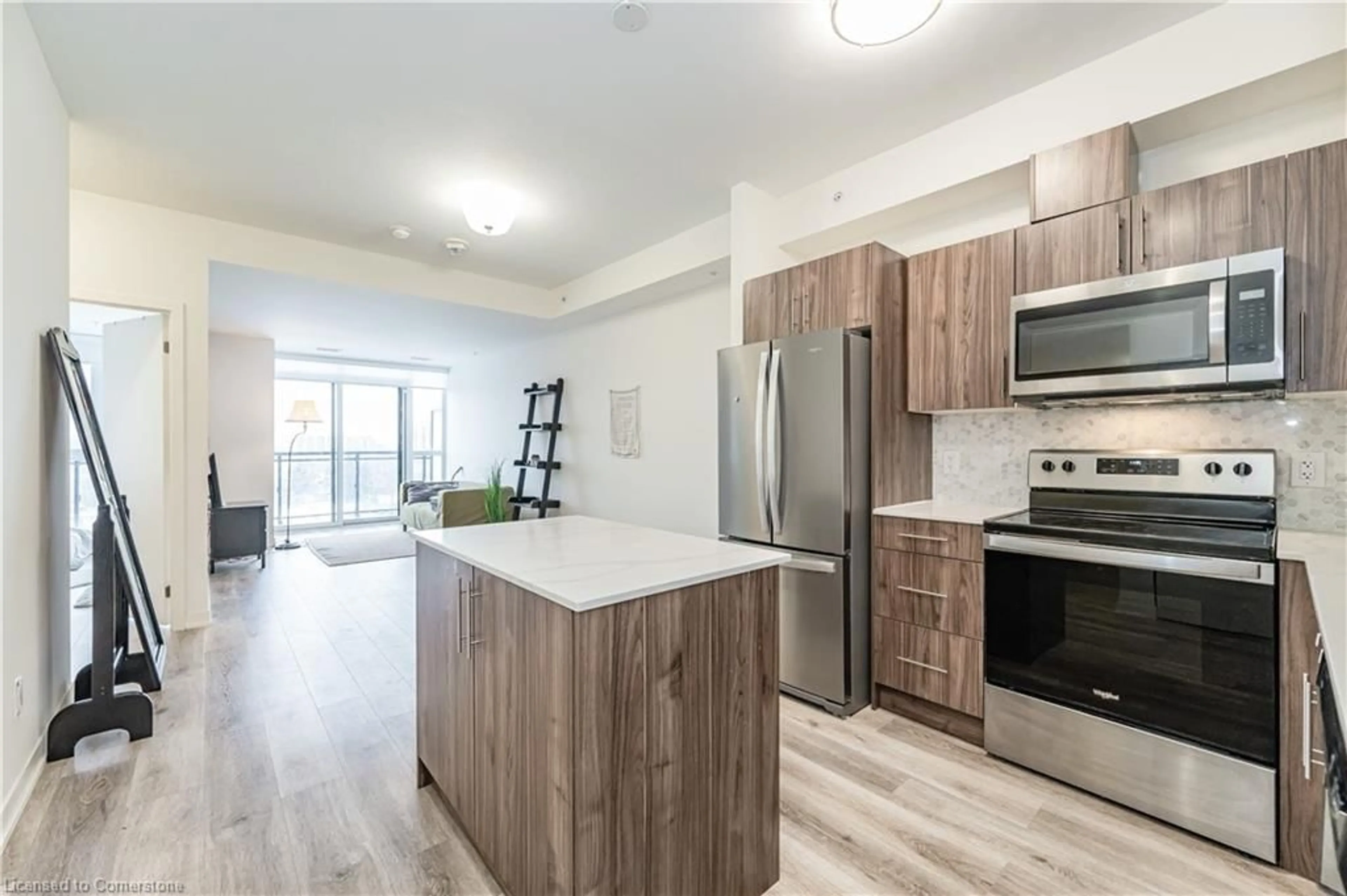 Open concept kitchen, wood/laminate floor for 128 King St #1205, Waterloo Ontario N2J 0E9