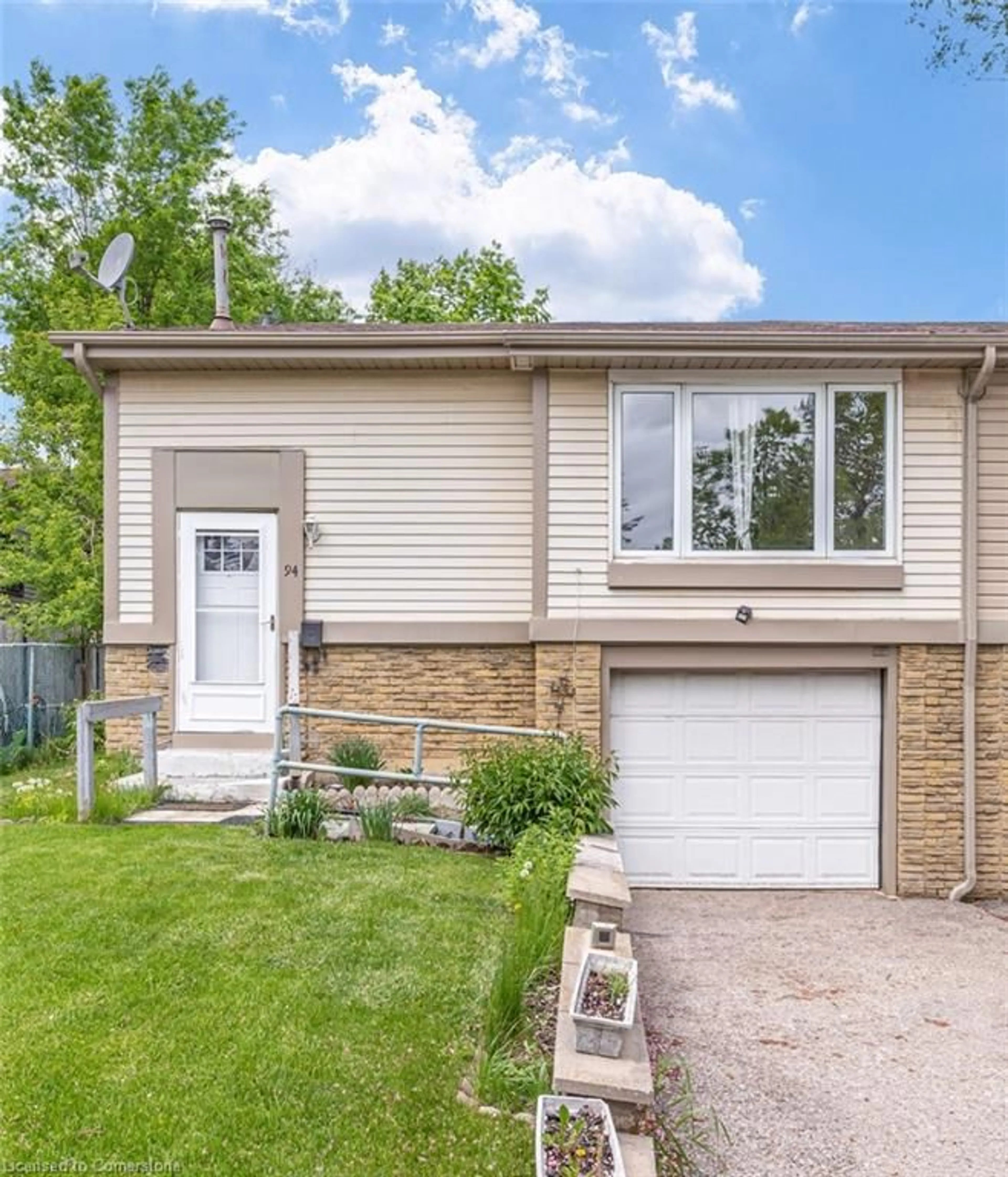 Home with vinyl exterior material, street for 94 Charters Rd, Brampton Ontario L6V 2S5