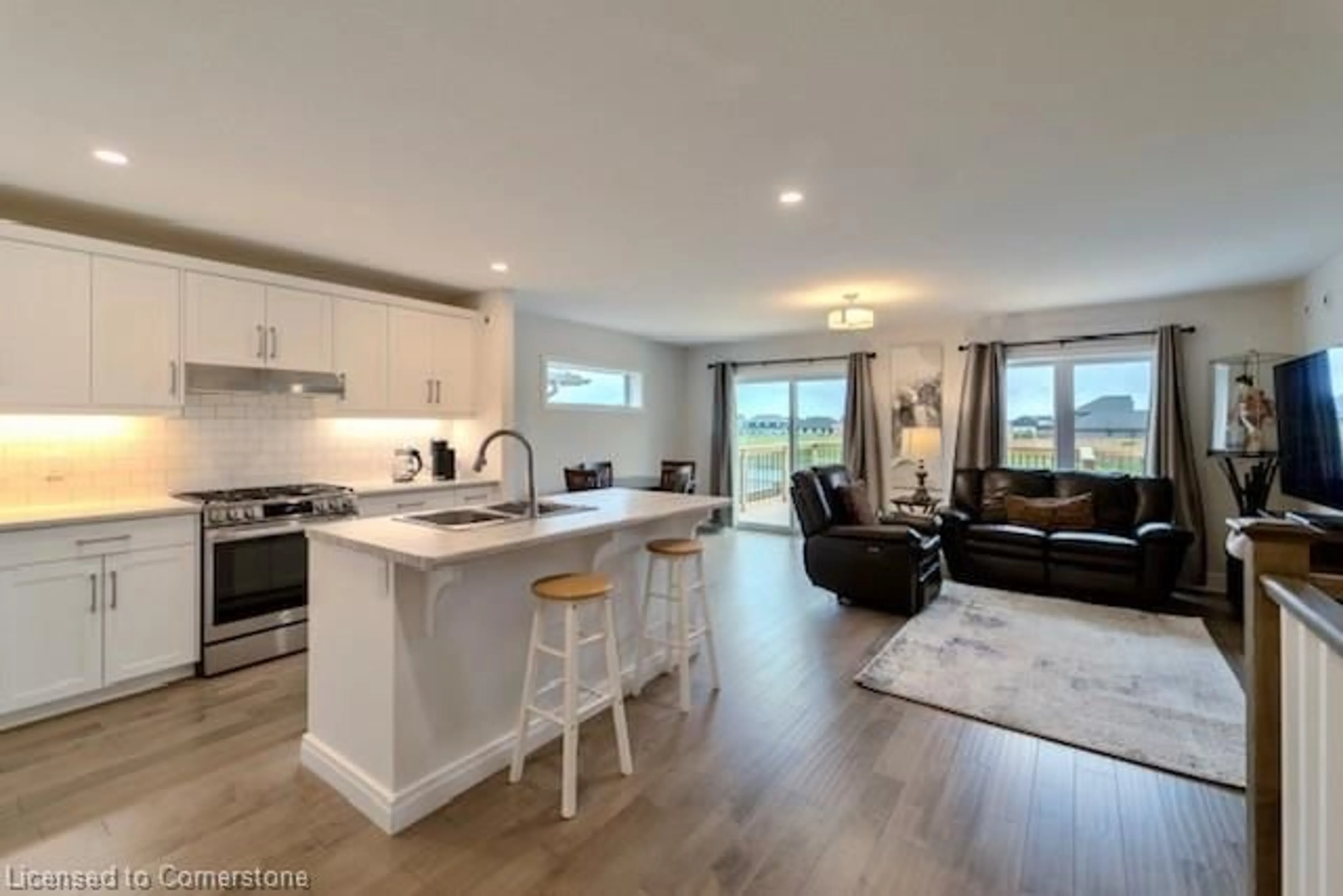 Open concept kitchen, wood/laminate floor for 8 Harlequin Crt, St. Thomas Ontario N5R 0L5