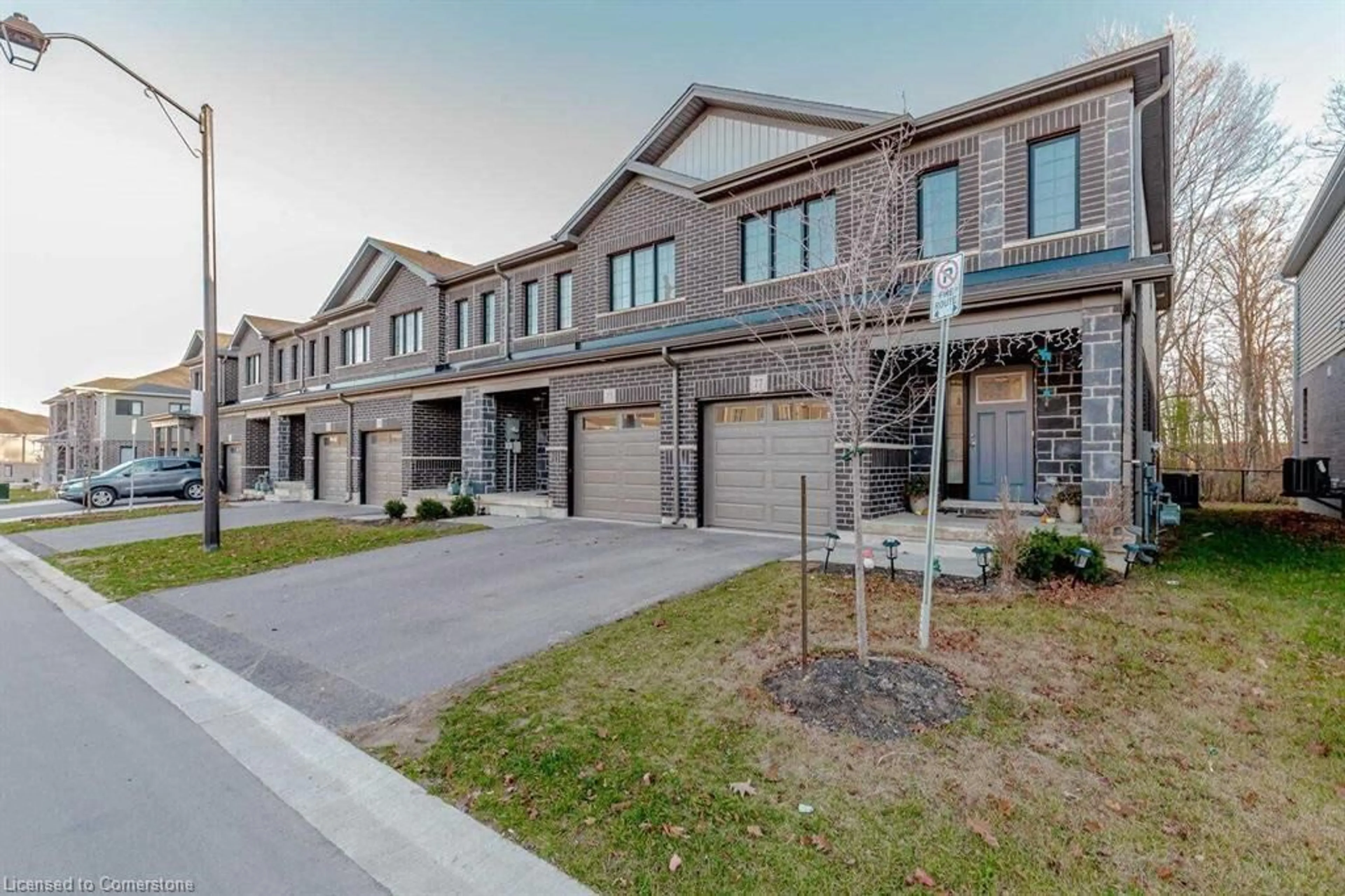 Home with brick exterior material, street for 77 Woodedge Cir, Kitchener Ontario N2R 0M8