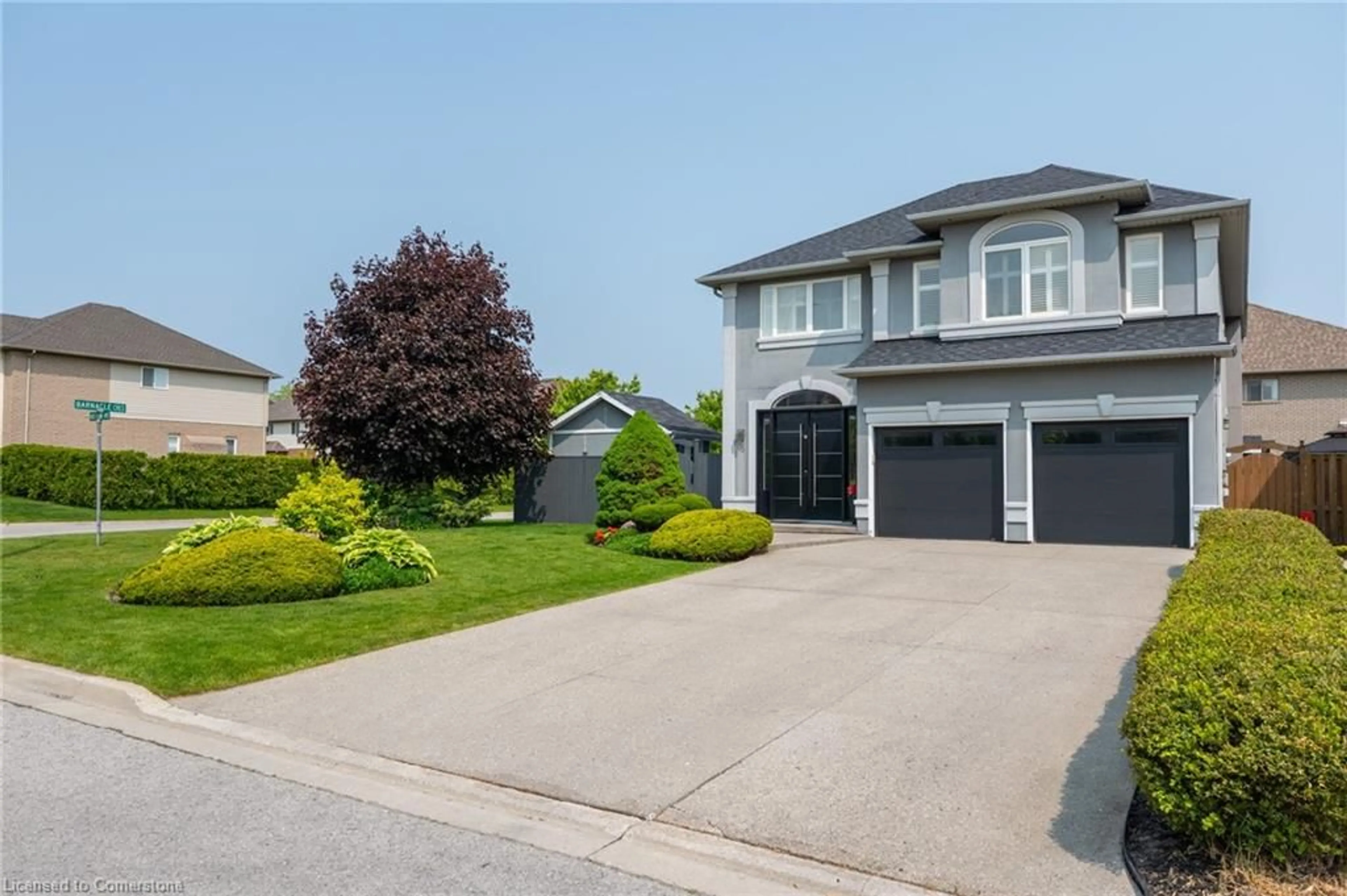 Home with vinyl exterior material, street for 63 Holkham Ave, Ancaster Ontario L9K 1N9