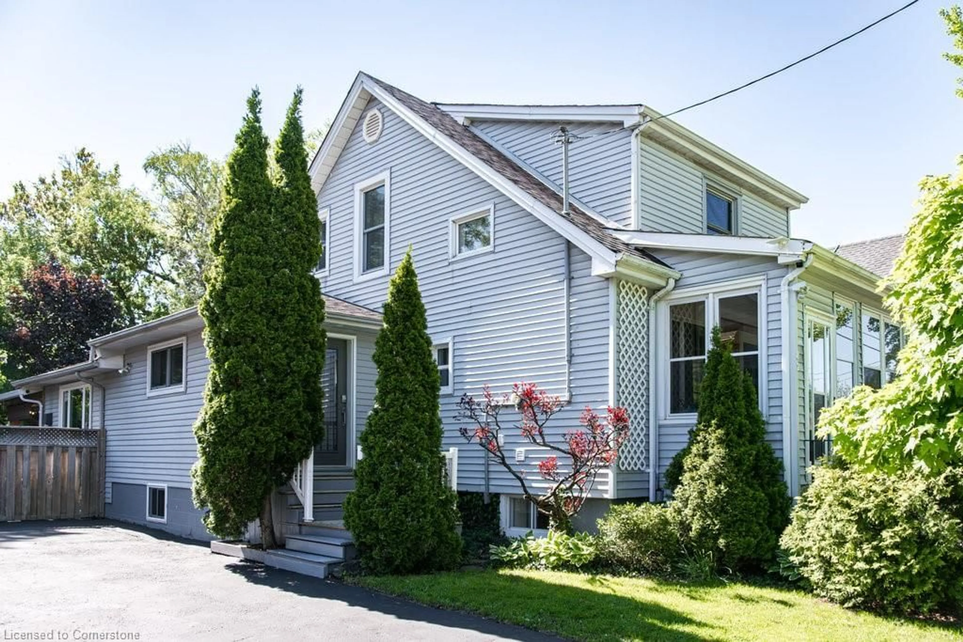 Home with vinyl exterior material, street for 87 East 9th St, Hamilton Ontario L9A 3M9
