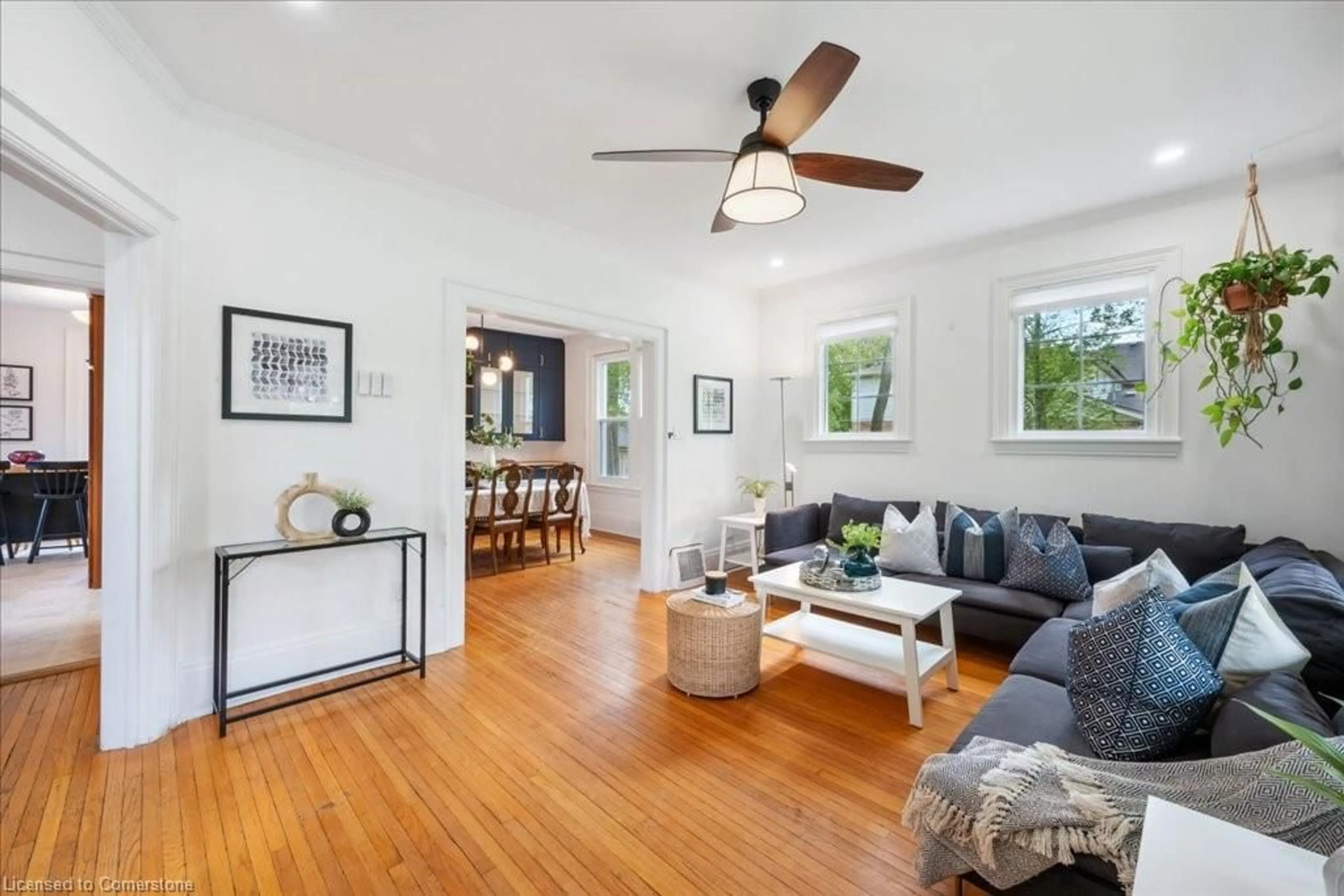 Living room with furniture, wood/laminate floor for 120 Waterloo Ave, Guelph Ontario N1H 3J1