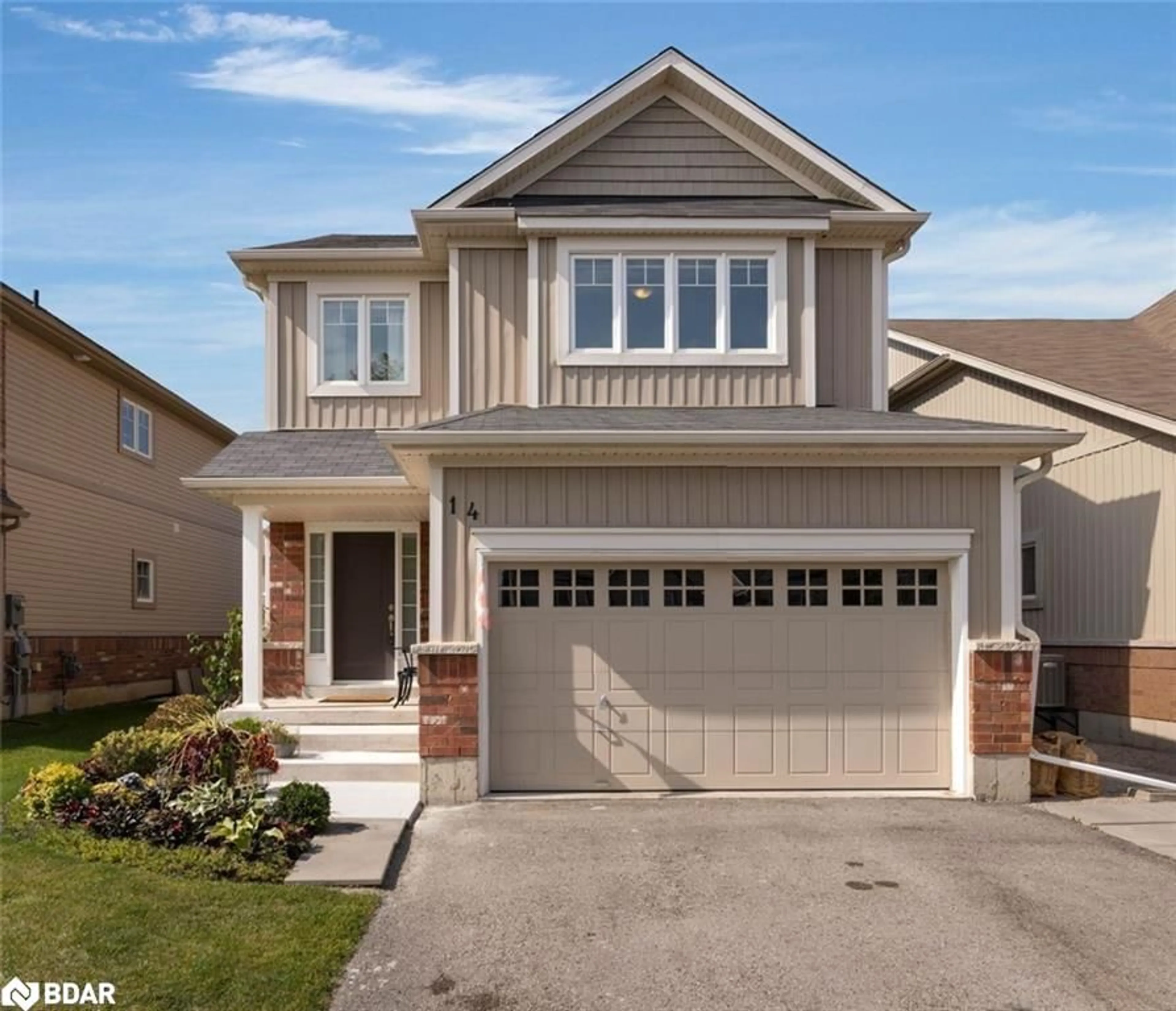 Home with vinyl exterior material, street for 14 Jones St, Alliston Ontario L9R 0C1