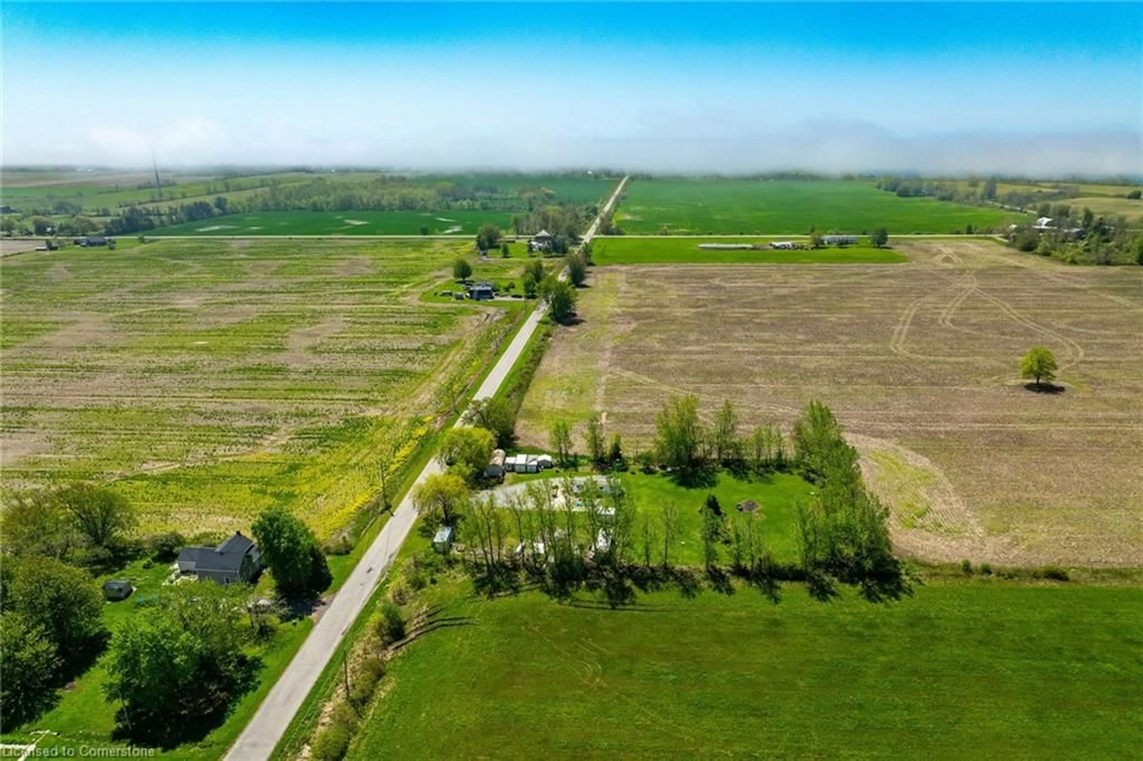 A pic from outside/outdoor area/front of a property/back of a property/a pic from drone, street for 199 Dickhout Rd, Lowbanks Ontario N0A 1K0