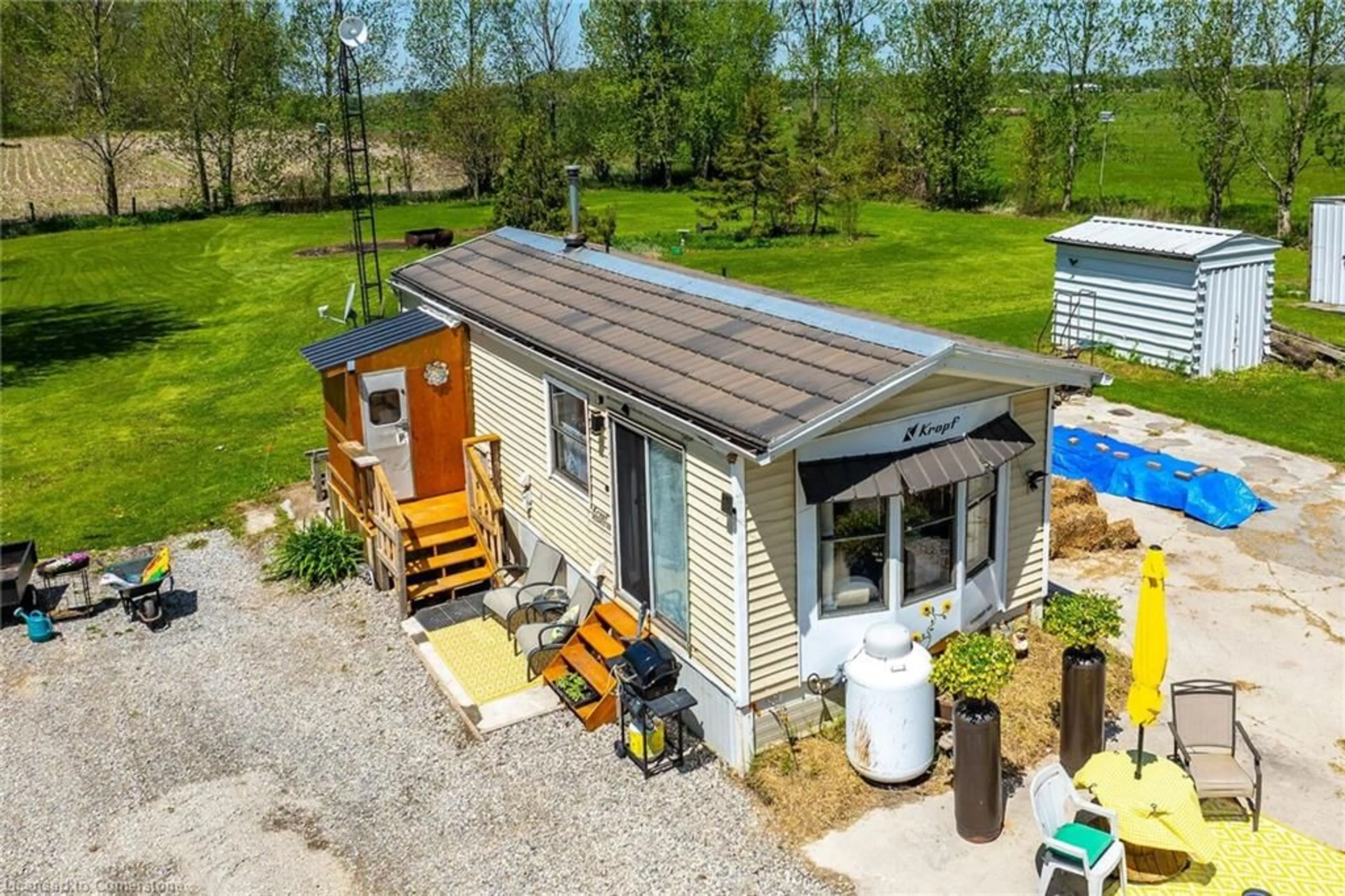 A pic from outside/outdoor area/front of a property/back of a property/a pic from drone, building for 199 Dickhout Rd, Lowbanks Ontario N0A 1K0