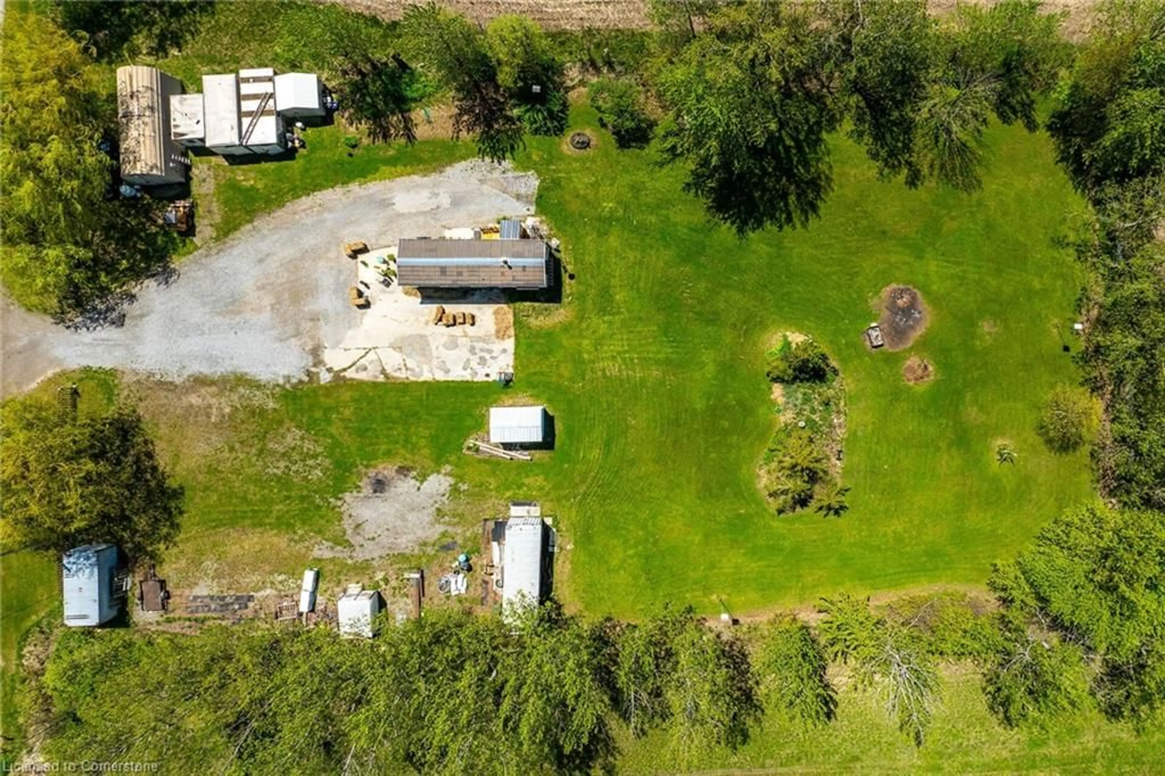 A pic from outside/outdoor area/front of a property/back of a property/a pic from drone, unknown for 199 Dickhout Rd, Lowbanks Ontario N0A 1K0