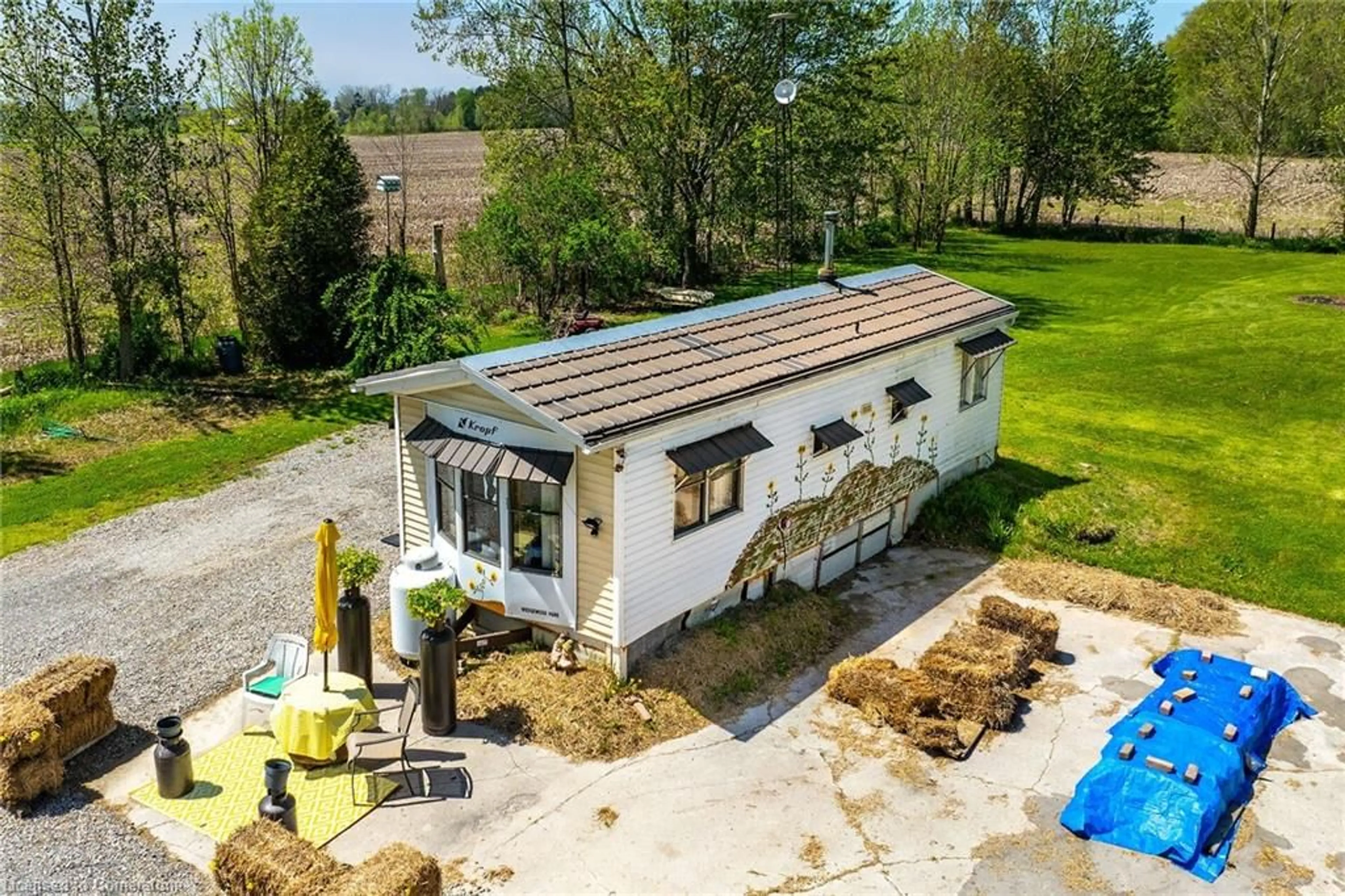 A pic from outside/outdoor area/front of a property/back of a property/a pic from drone, building for 199 Dickhout Rd, Lowbanks Ontario N0A 1K0