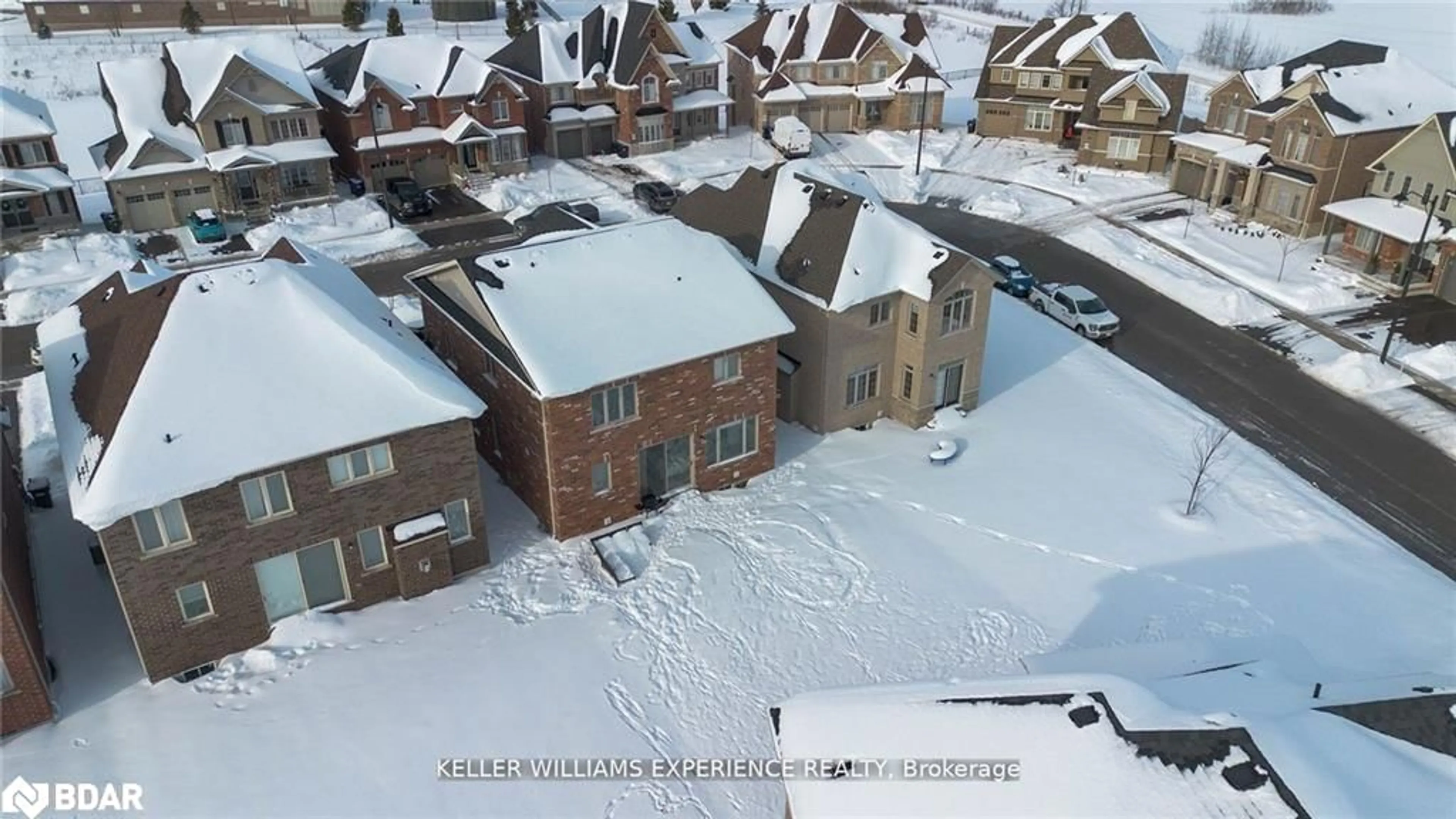 A pic from outside/outdoor area/front of a property/back of a property/a pic from drone, street for 26 Sanford Circle, Minesing Ontario L9X 2A8