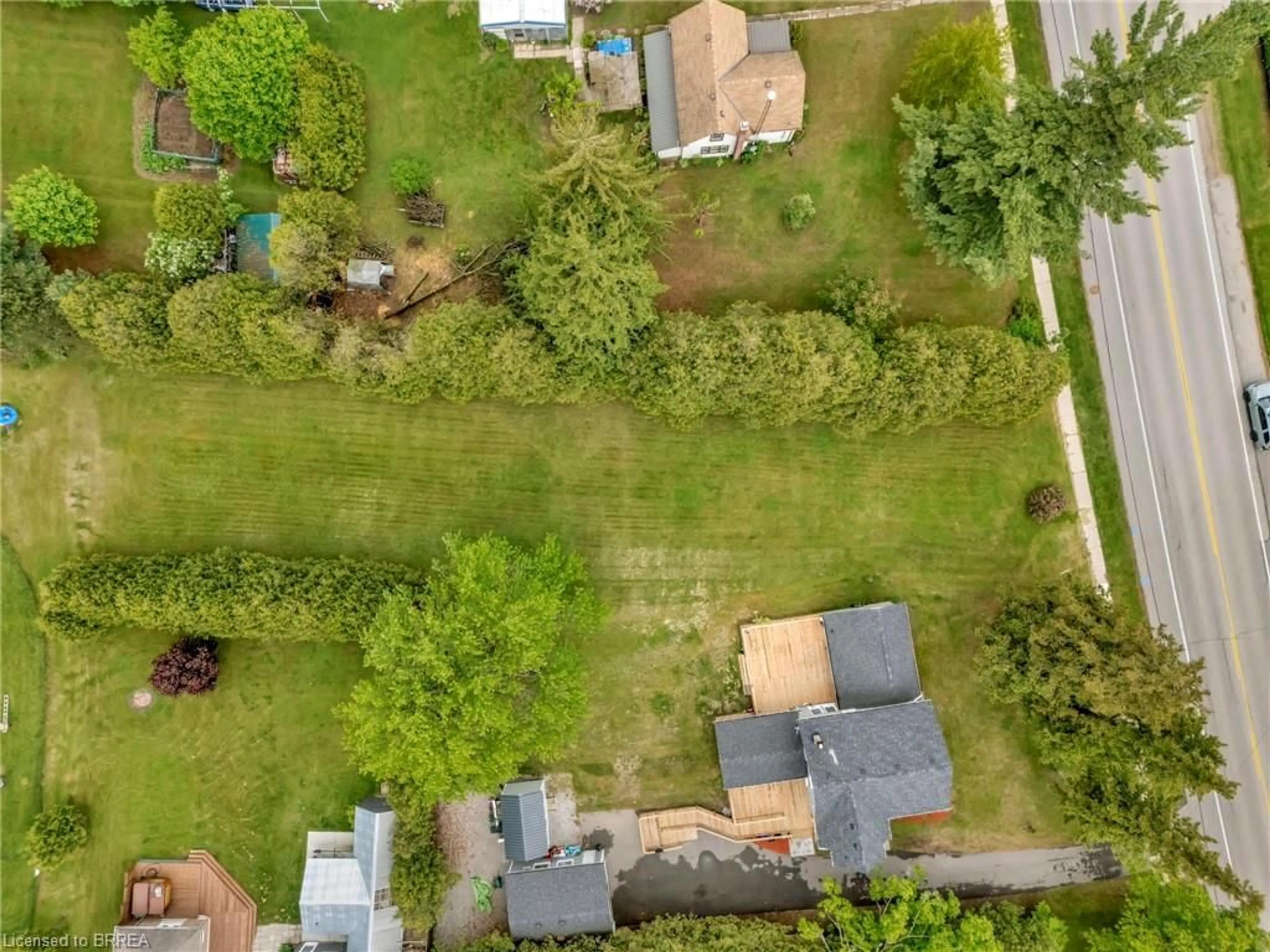 A pic from outside/outdoor area/front of a property/back of a property/a pic from drone, street for 729 Mount Pleasant Rd #B, Mount Pleasant Ontario N0E 1K0