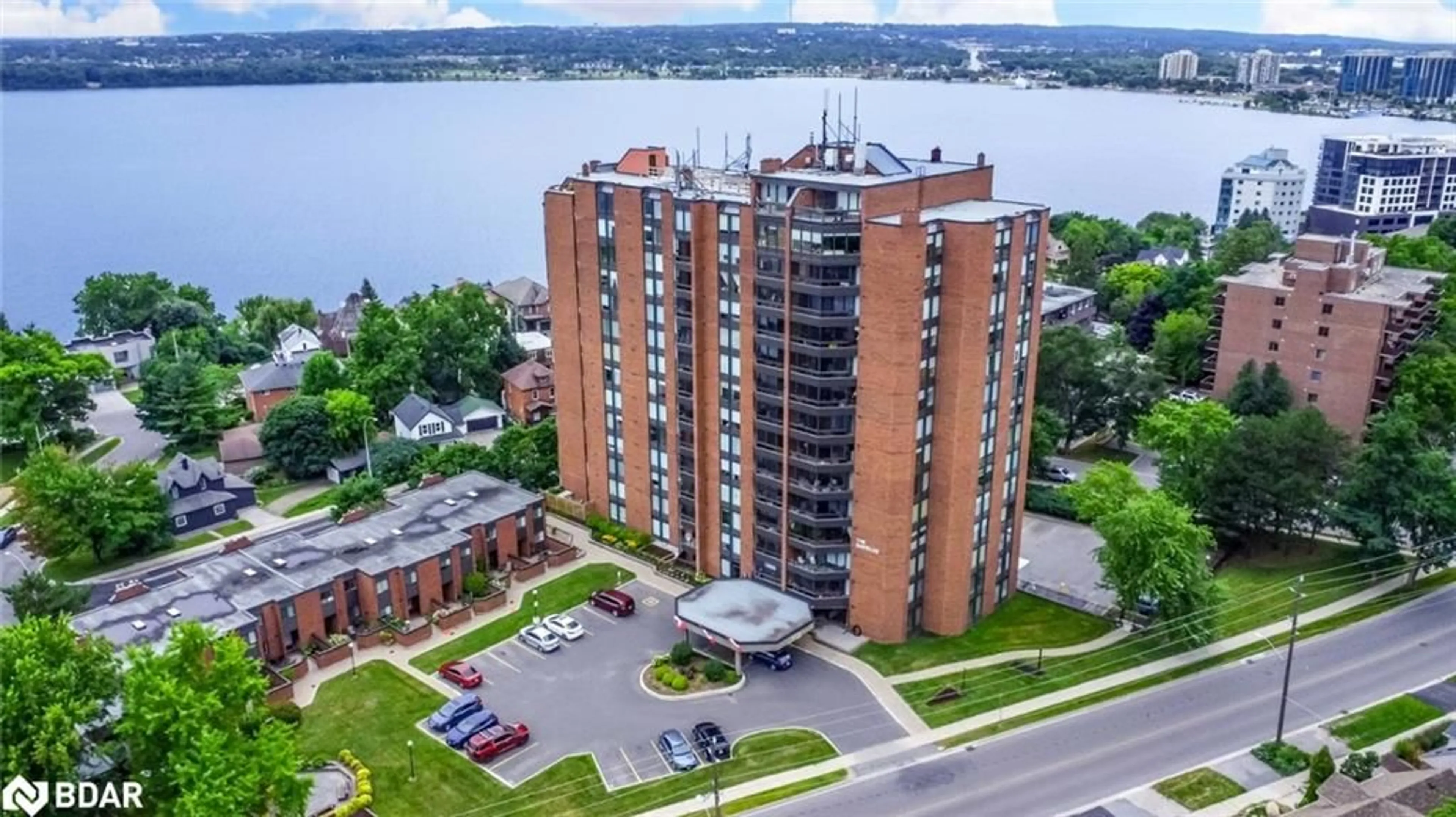A pic from outside/outdoor area/front of a property/back of a property/a pic from drone, water/lake/river/ocean view for 181 Collier St #504, Barrie Ontario L4M 5L6