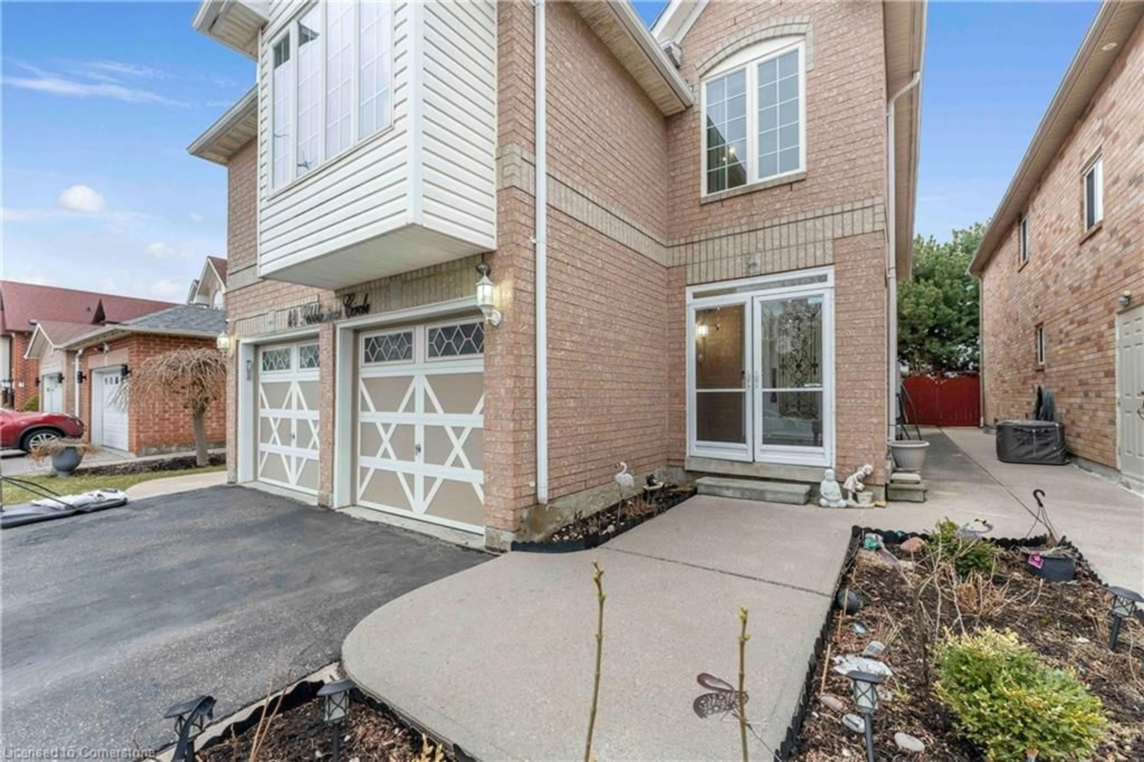 Home with brick exterior material, street for 44 Pebblestone Cir, Brampton Ontario L6X 4N2