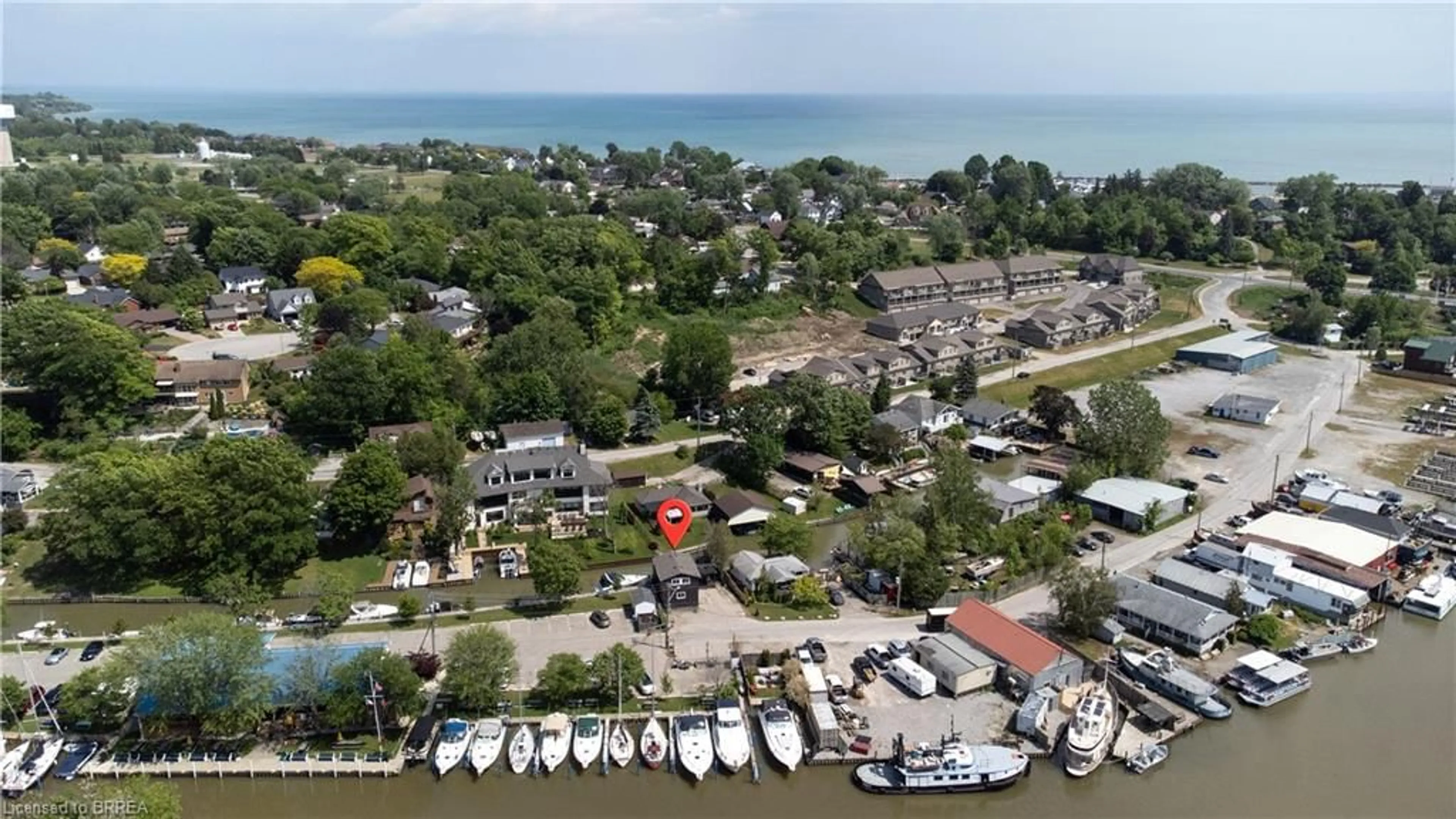 A pic from outside/outdoor area/front of a property/back of a property/a pic from drone, water/lake/river/ocean view for 52 River Dr, Port Dover Ontario N0A 1N7