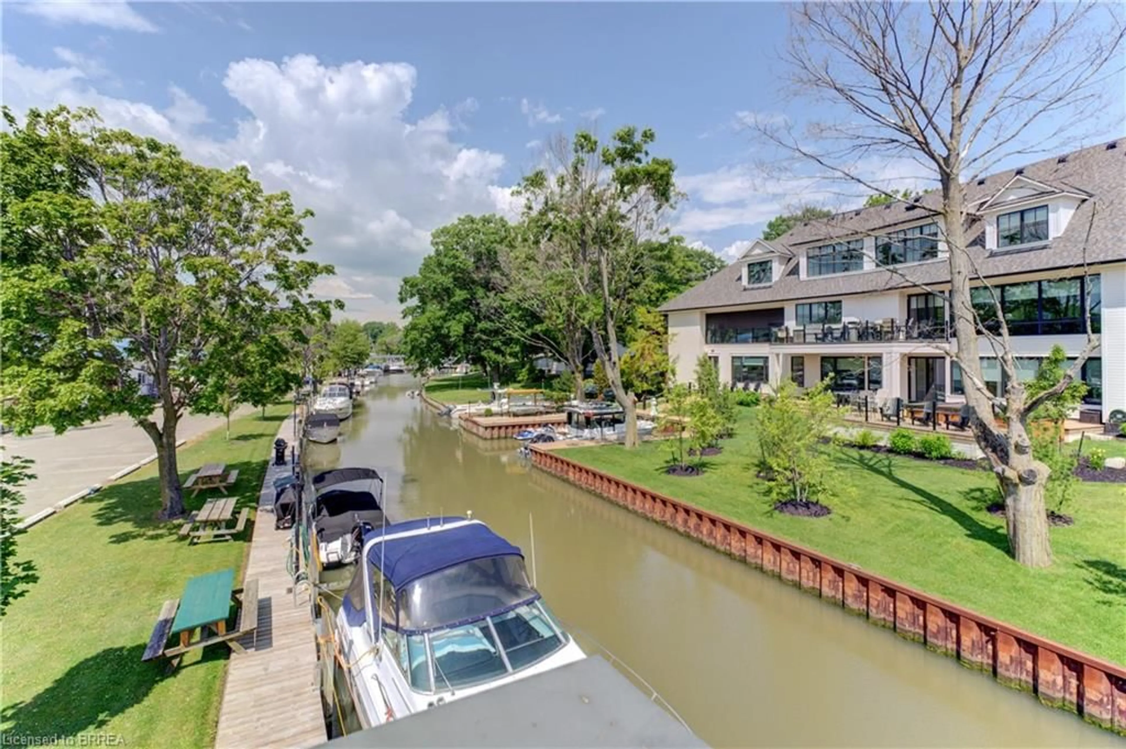 A pic from outside/outdoor area/front of a property/back of a property/a pic from drone, water/lake/river/ocean view for 52 River Dr, Port Dover Ontario N0A 1N7
