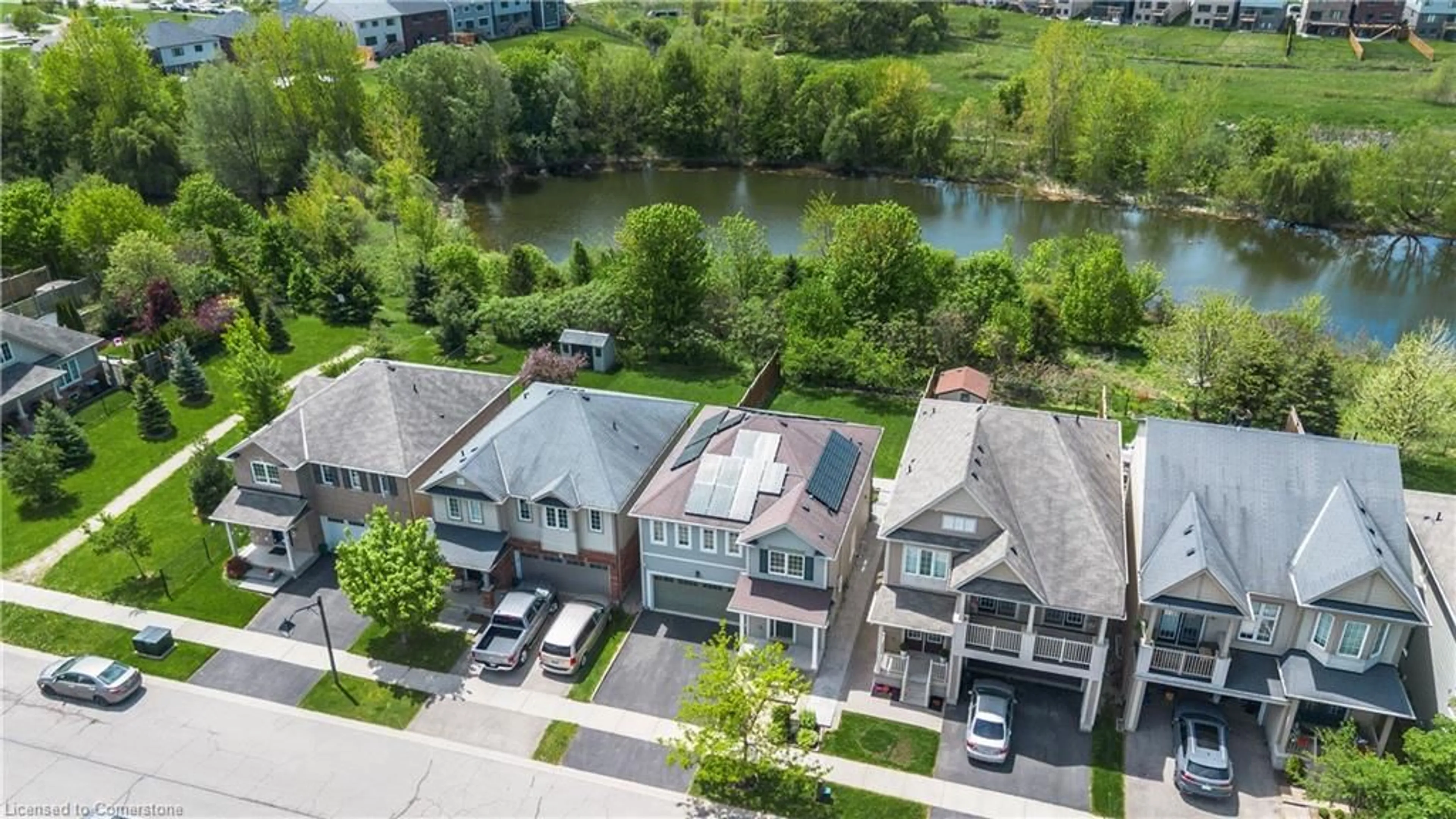 A pic from outside/outdoor area/front of a property/back of a property/a pic from drone, water/lake/river/ocean view for 68 Bisset Ave, Brantford Ontario N3T 0H3