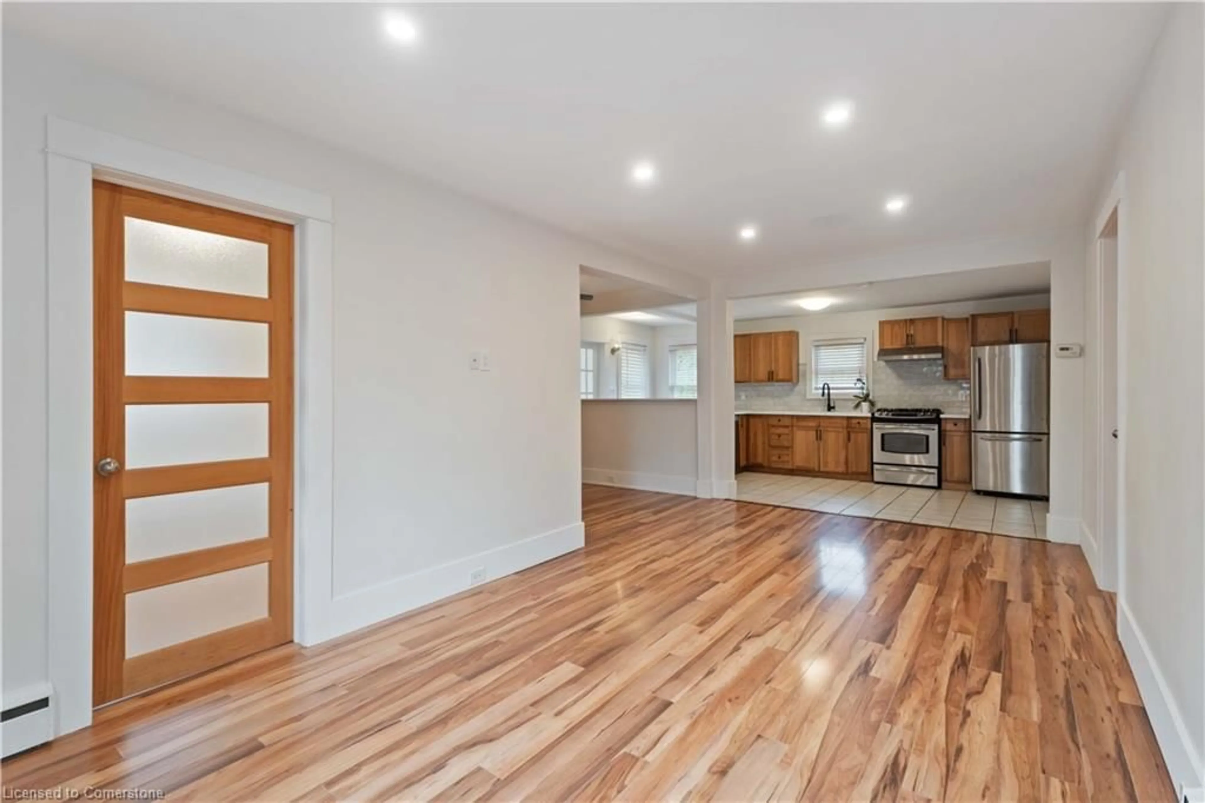 Open concept kitchen, wood/laminate floor for 543 Vine St, St. Catharines Ontario L2M 3T5