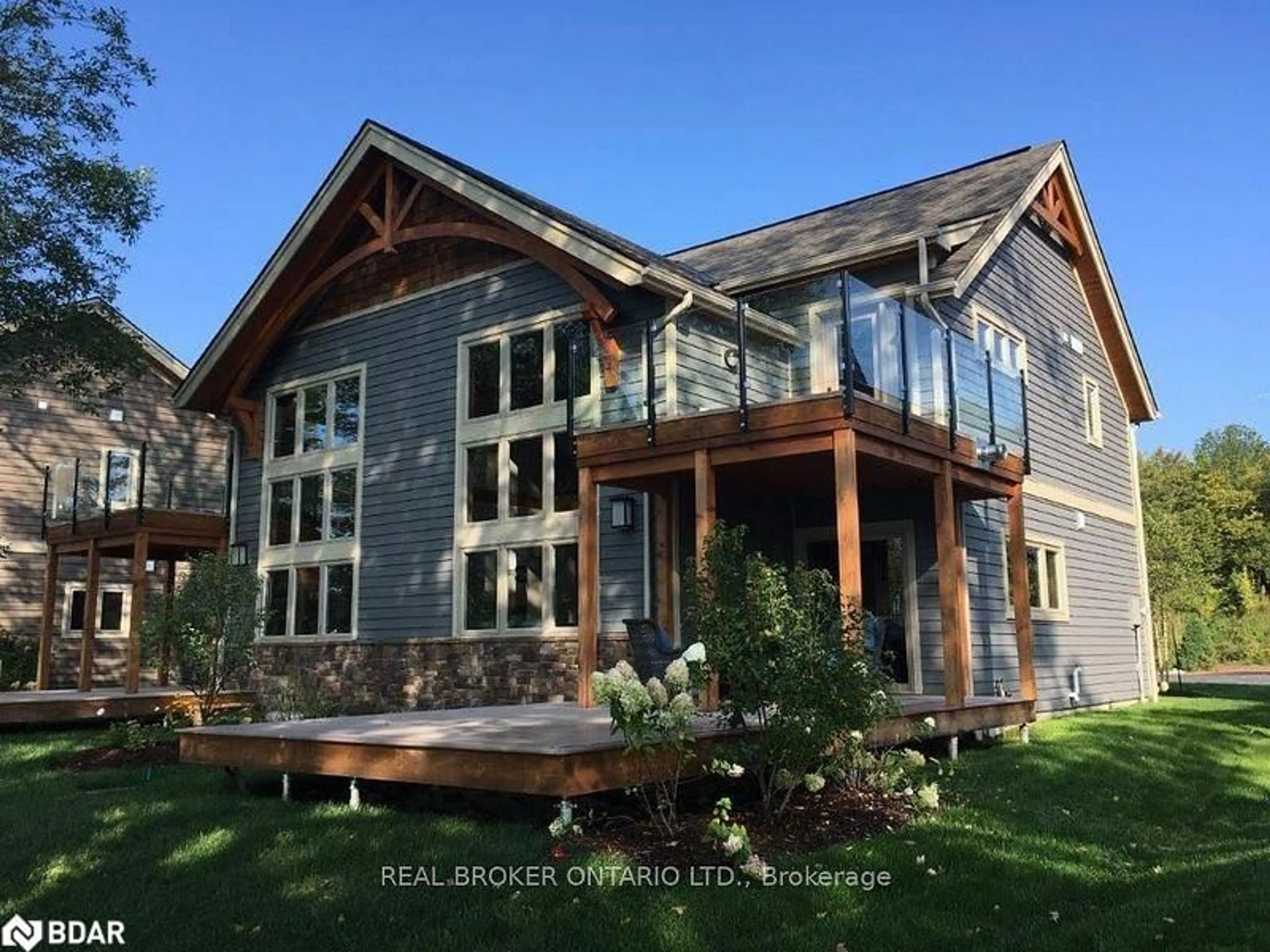Home with vinyl exterior material, unknown for 1841 Muskoka Road 118 Rd #1B, Bracebridge Ontario P1L 1W8