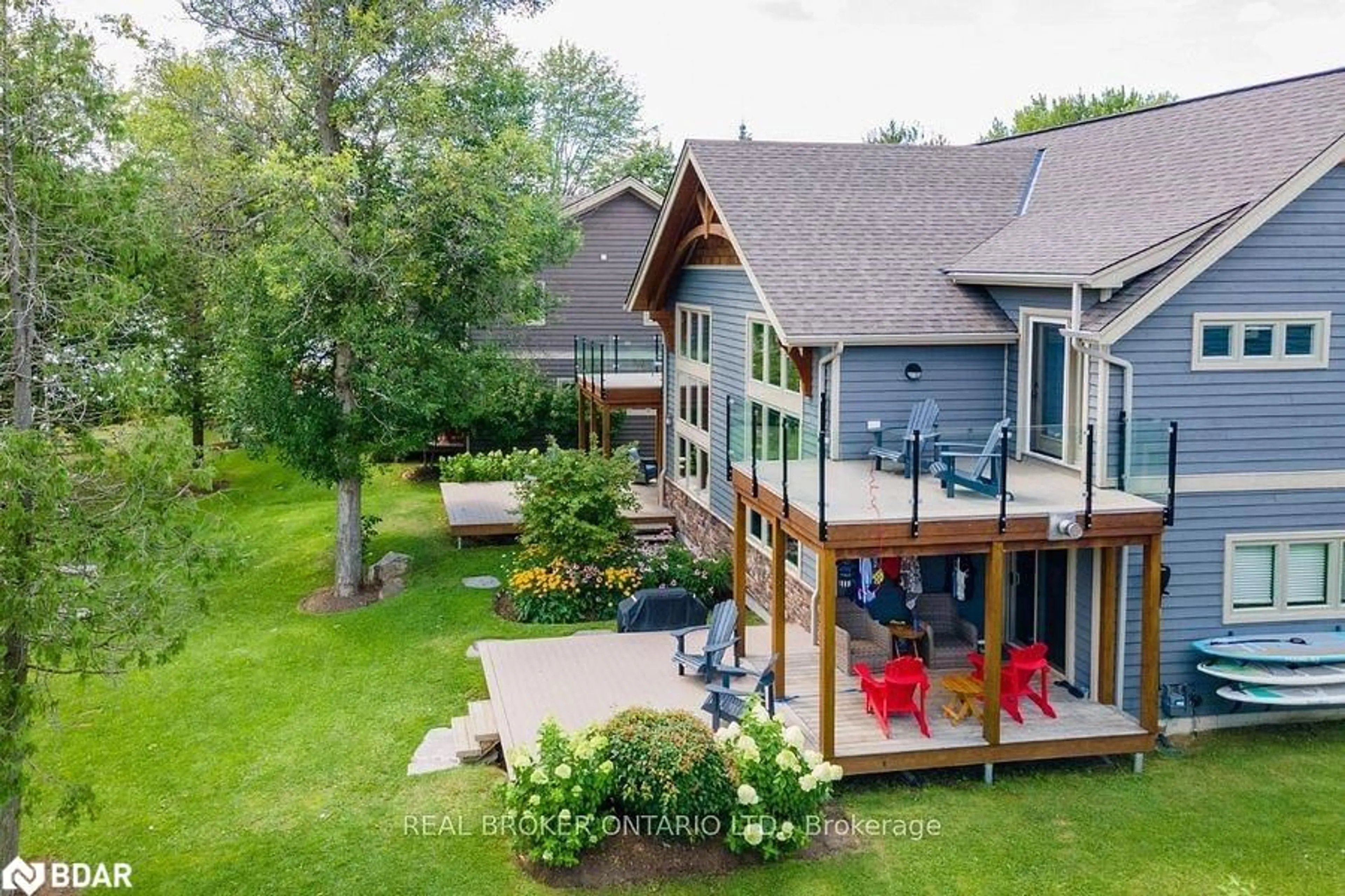 A pic from outside/outdoor area/front of a property/back of a property/a pic from drone, water/lake/river/ocean view for 1841 Muskoka Road 118 Rd #1B, Bracebridge Ontario P1L 1W8