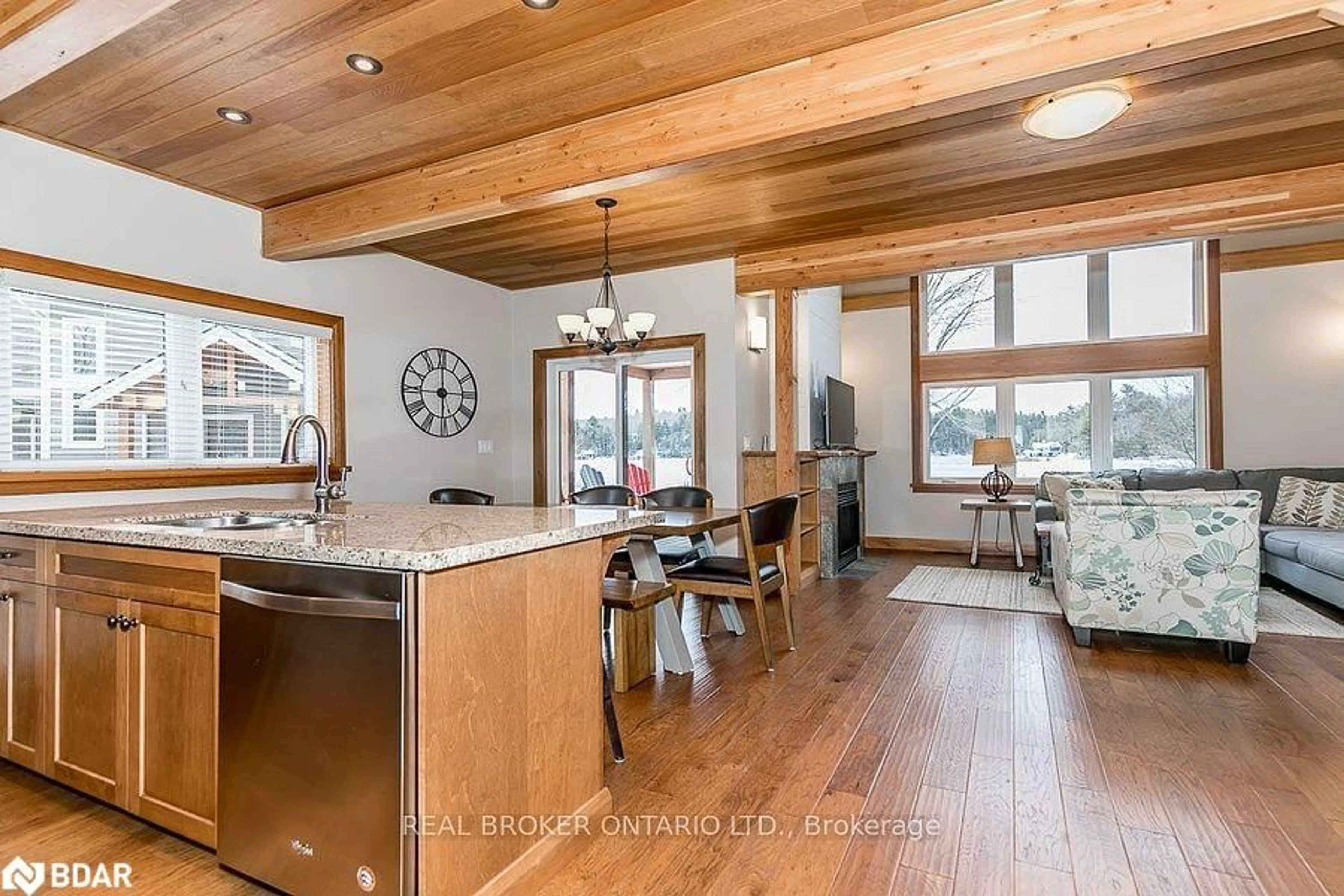 Open concept kitchen, wood/laminate floor for 1841 Muskoka Road 118 Rd #1B, Bracebridge Ontario P1L 1W8