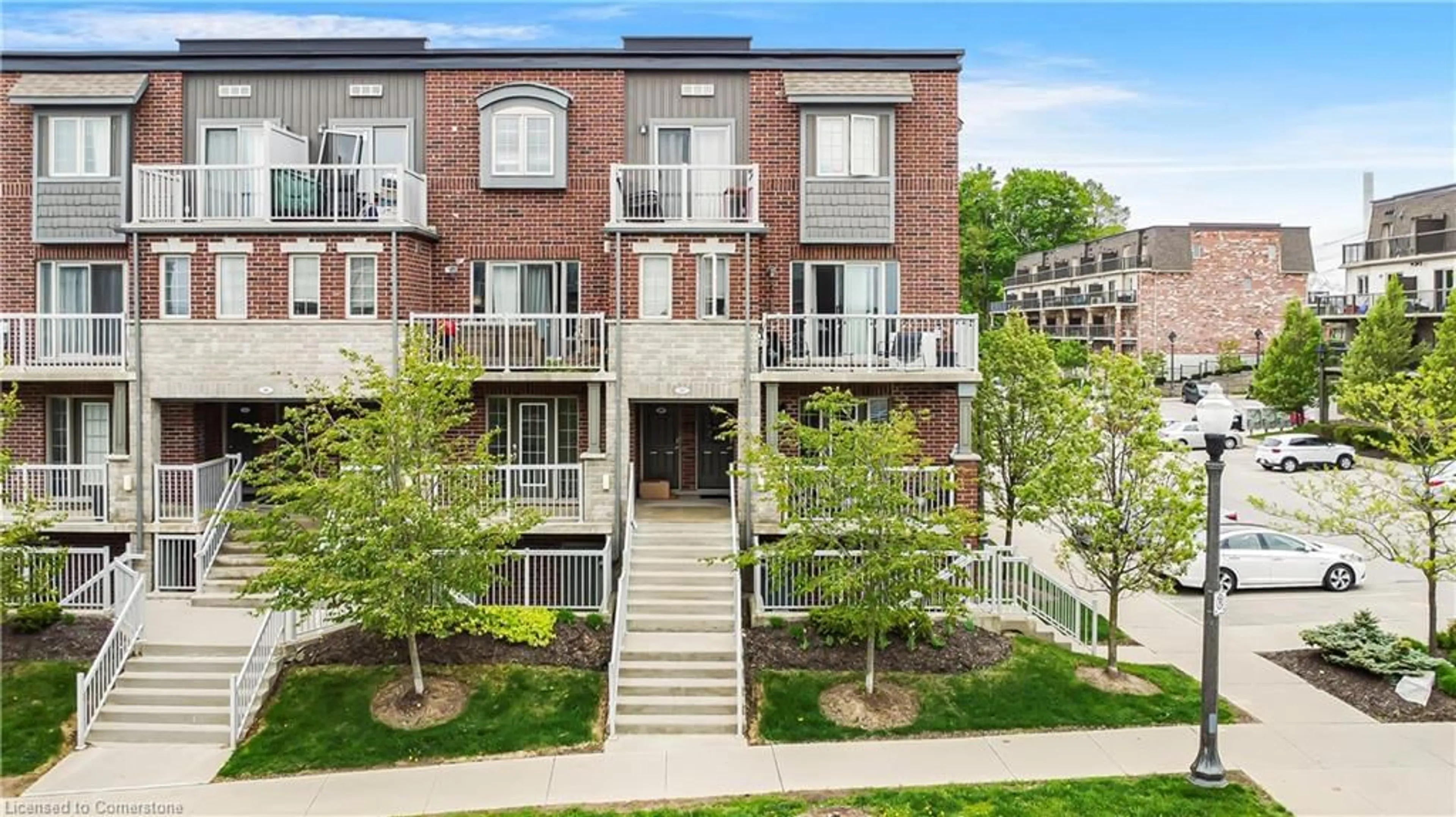 Home with brick exterior material, street for 20 Sienna St #C, Kitchener Ontario N2R 1P7