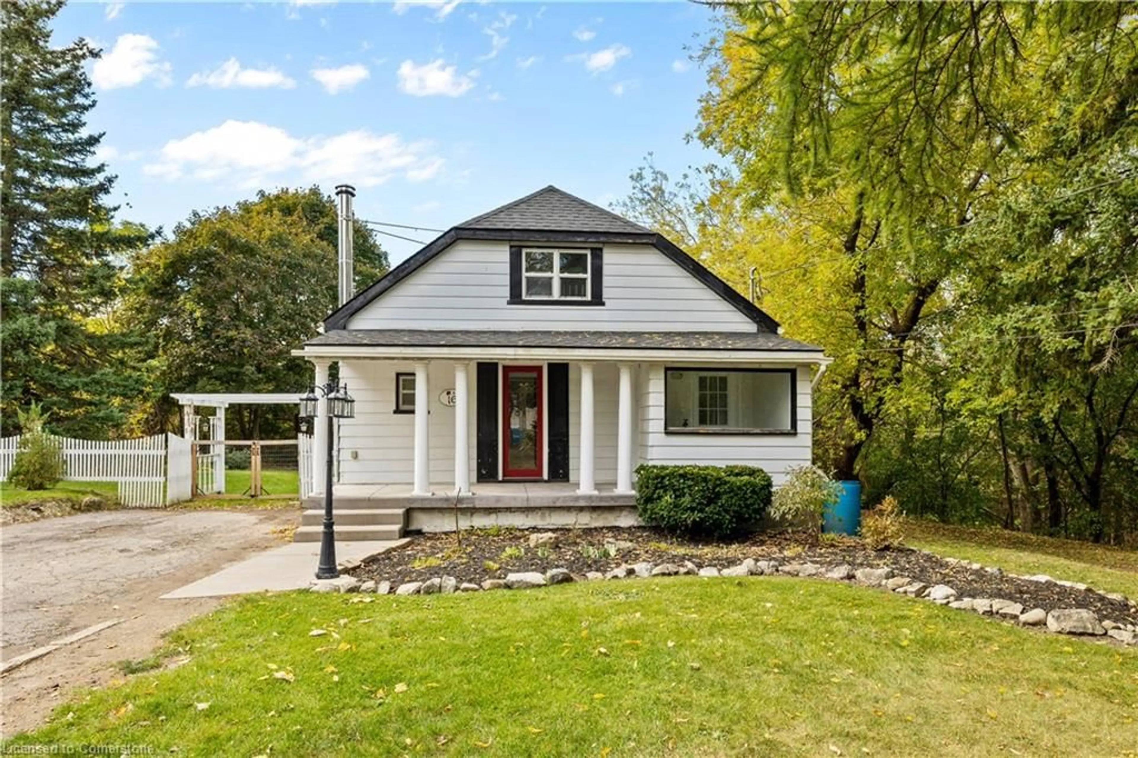 Home with vinyl exterior material, street for 16 Norman Lane, Cambridge Ontario N1R 5L9