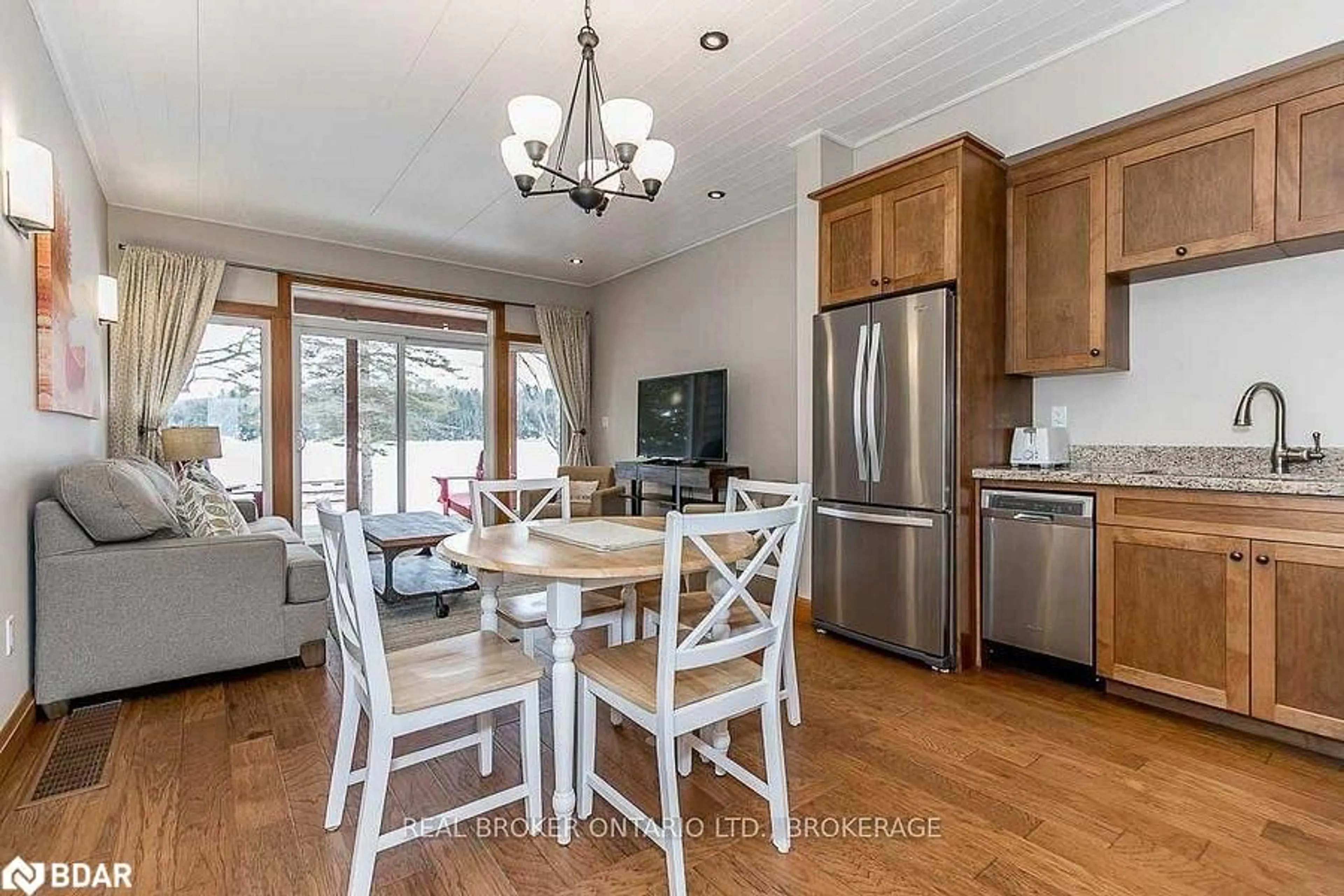 Open concept kitchen, wood/laminate floor for 1841 Muskoka Road 118 Rd #2B, Bracebridge Ontario P1L 1W8