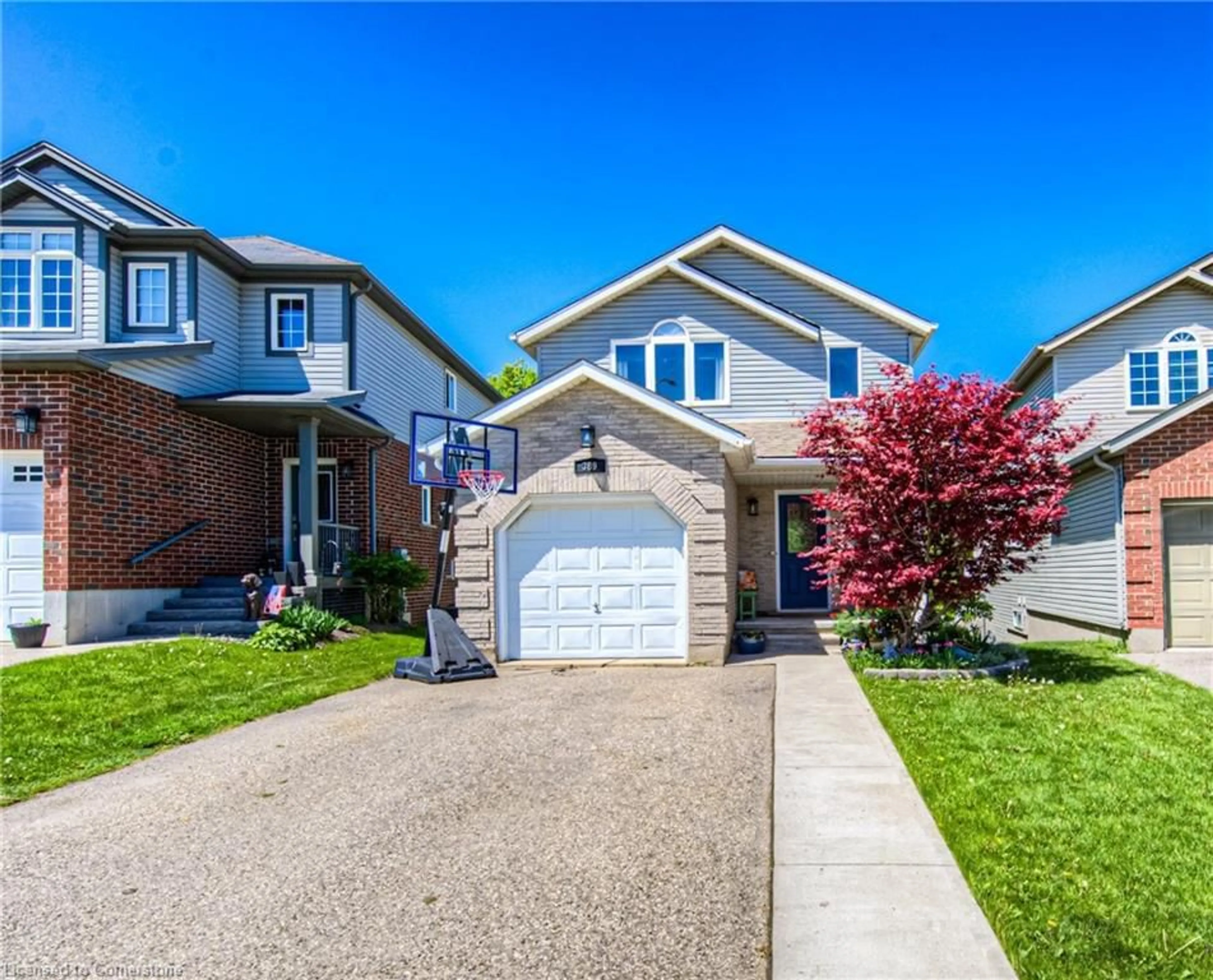 Home with brick exterior material, street for 389 Westmeadow Dr, Kitchener Ontario N2N 3K8