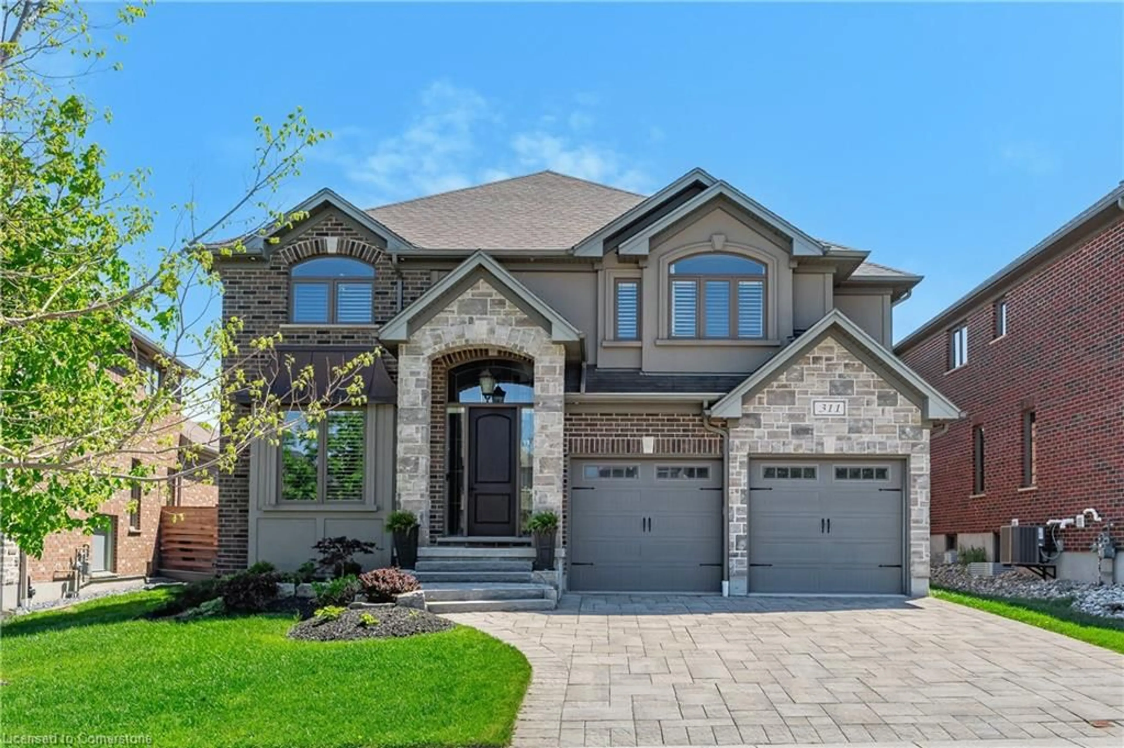 Home with brick exterior material, street for 311 Deerfoot Trail, Waterloo Ontario N2K 0B3