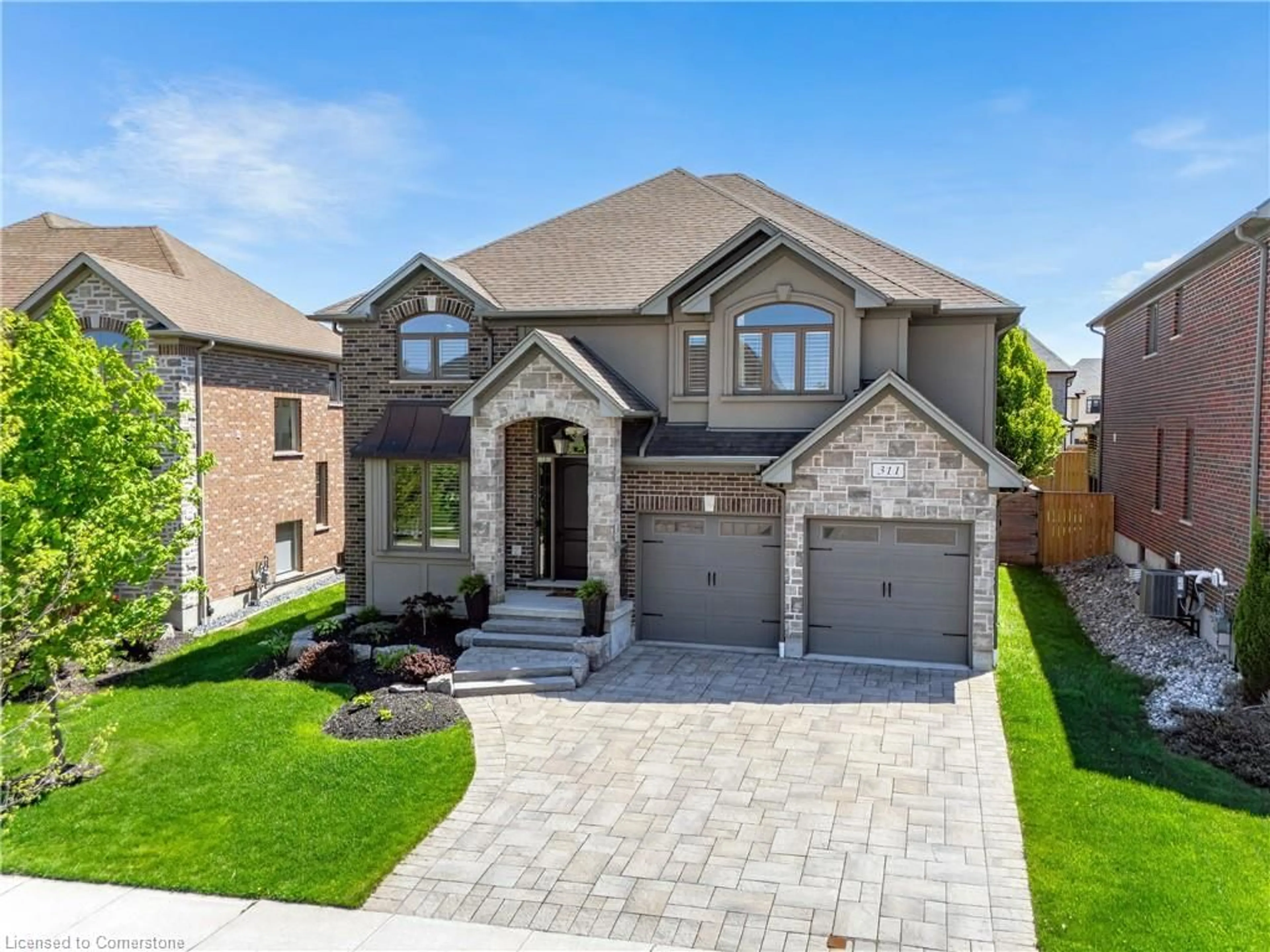 Home with brick exterior material, street for 311 Deerfoot Trail, Waterloo Ontario N2K 0B3