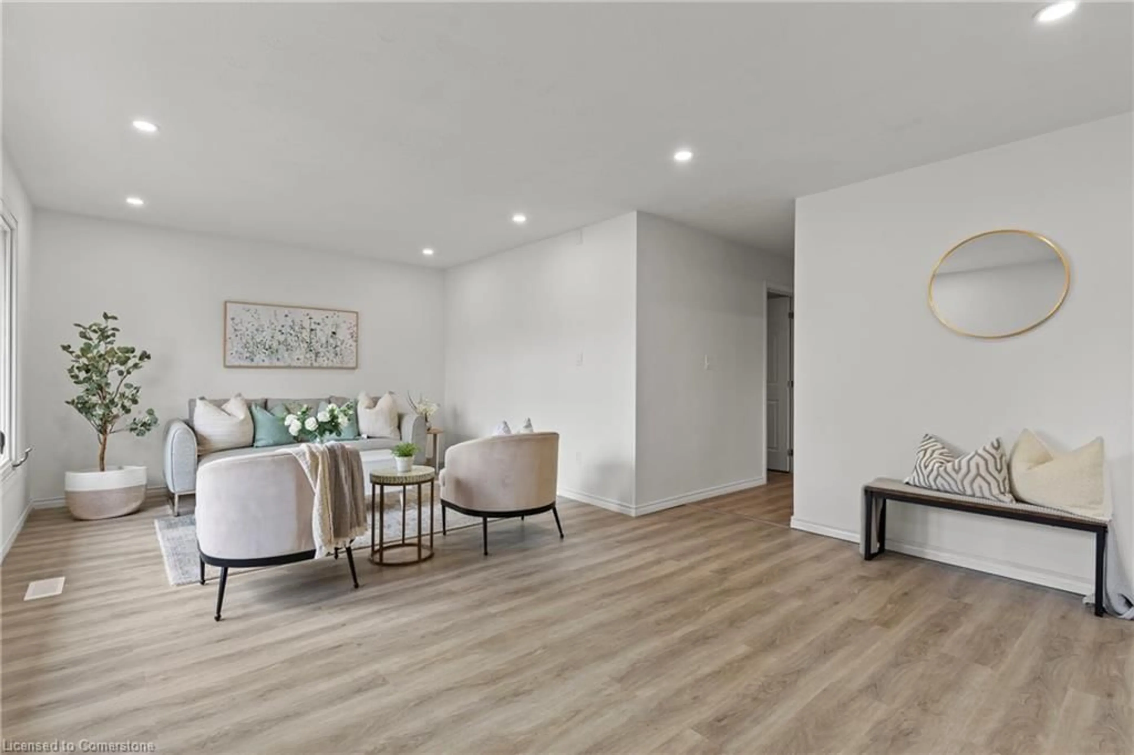 Living room with furniture, wood/laminate floor for 215 Mackenzie Cres, Caledonia Ontario N3W 1A7