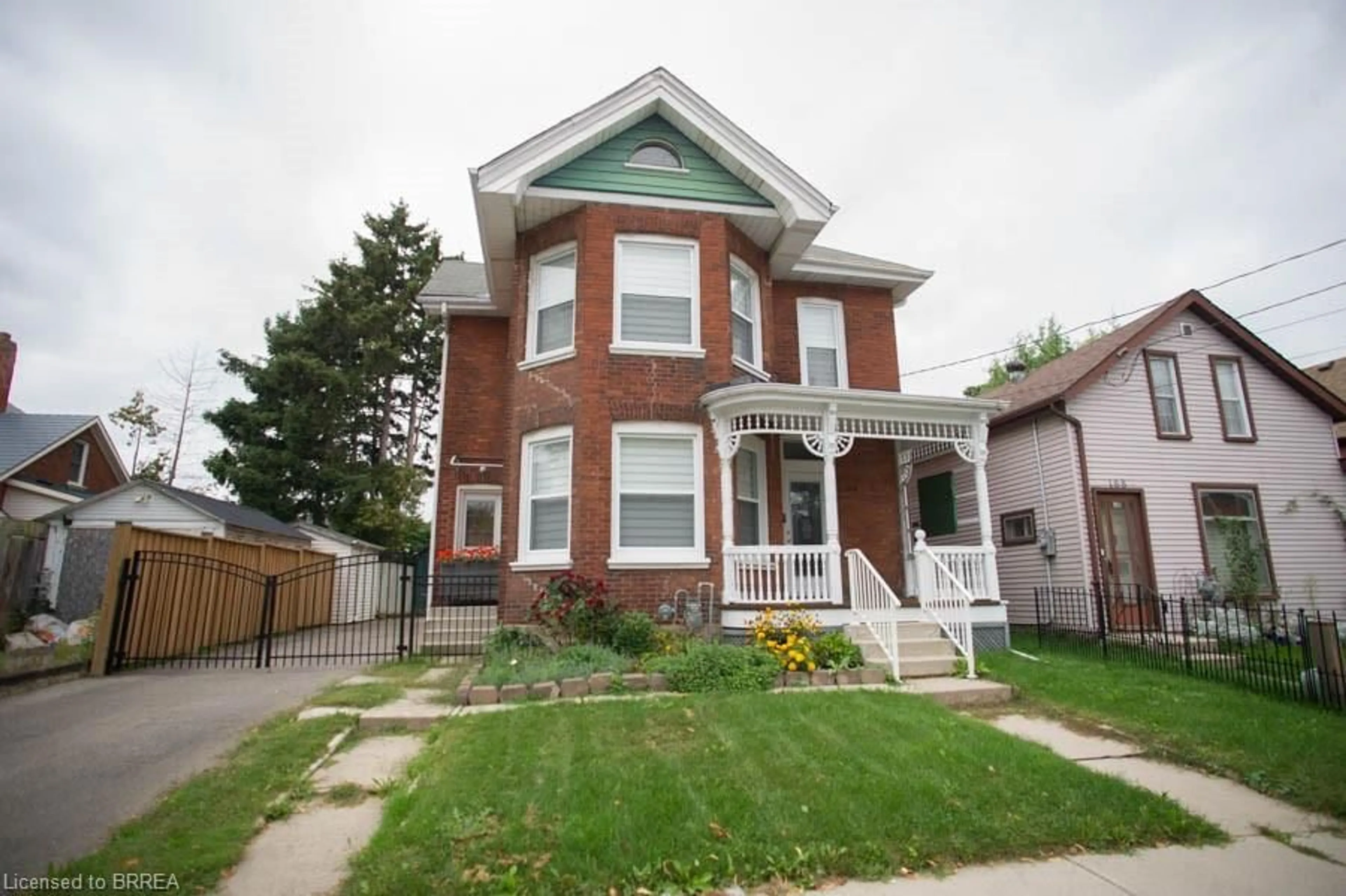 Home with brick exterior material, street for 166 Brock St, Brantford Ontario N3S 5W4