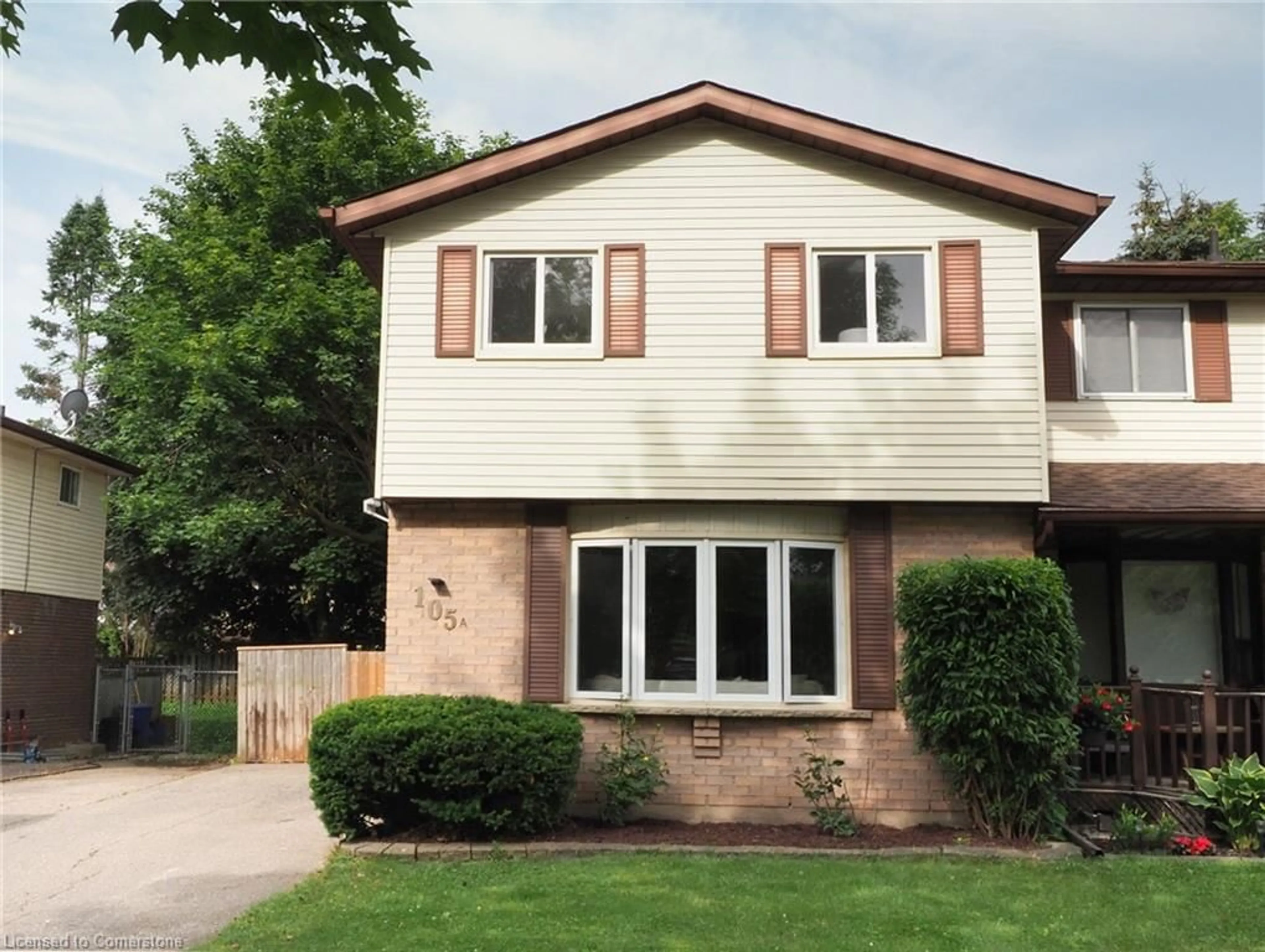 Home with vinyl exterior material, street for 105 Northlake Dr #A, Waterloo Ontario N2V 1M2