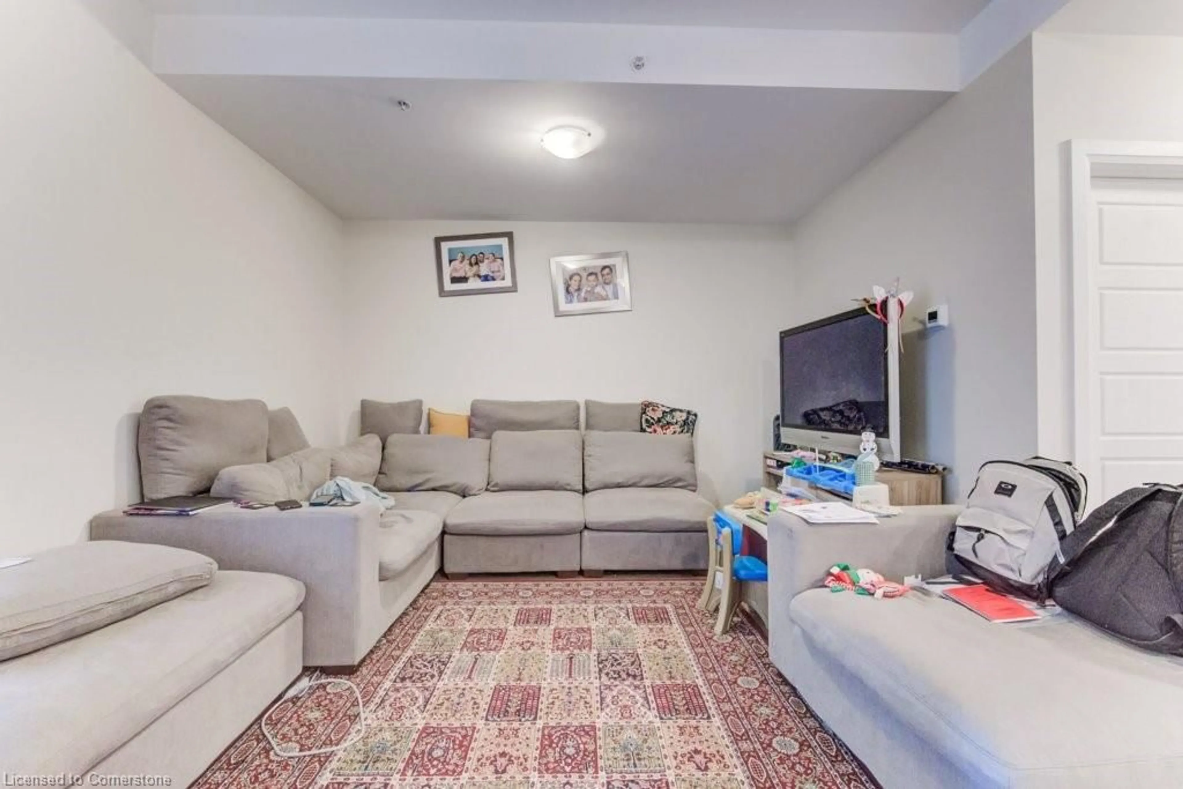 Living room with furniture, unknown for 5 Wake Robin Dr #303, Kitchener Ontario N2E 0H6