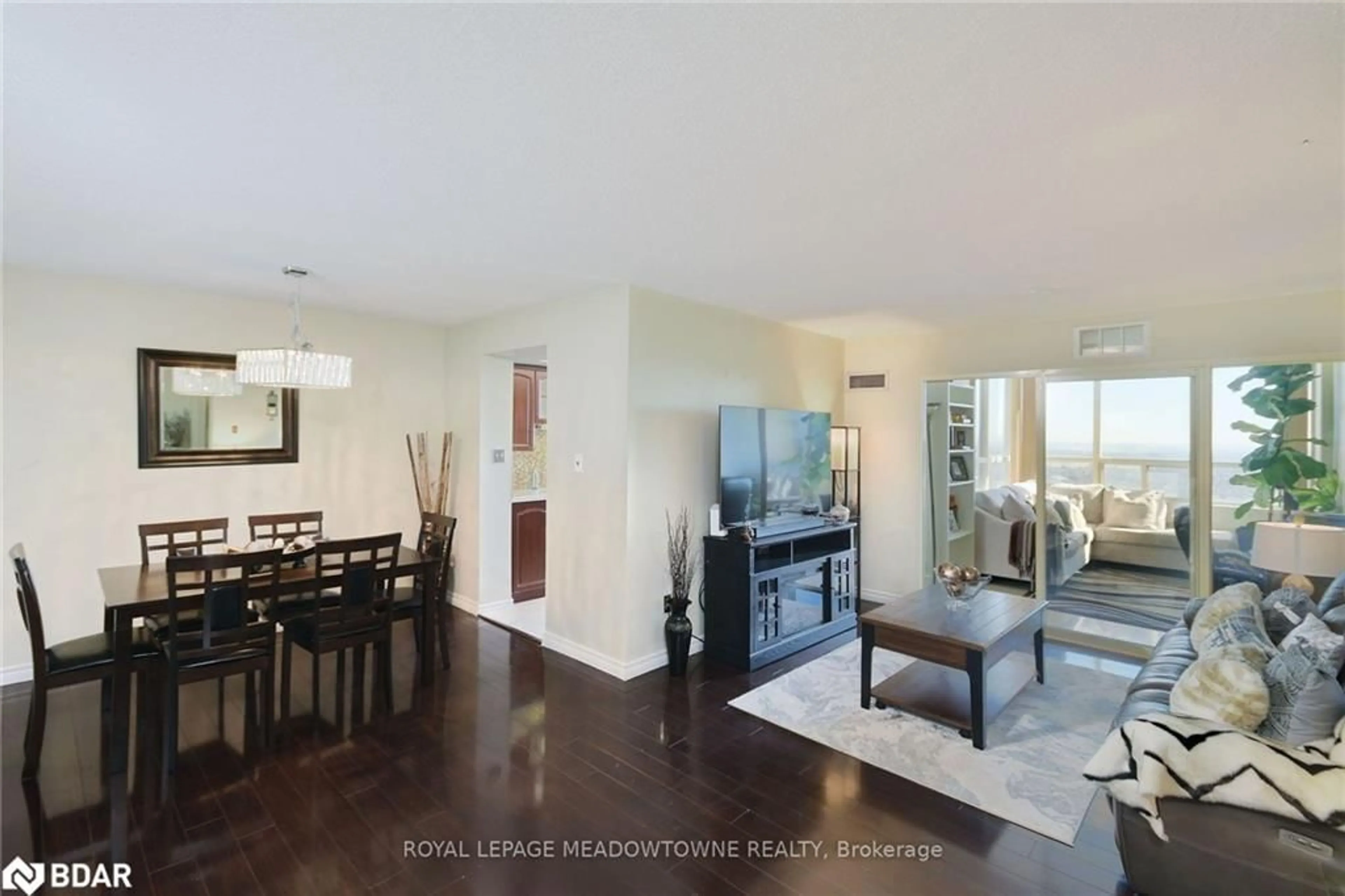 Living room with furniture, wood/laminate floor for 30 Malta Ave #2110, Peel Ontario L6Y 4S5