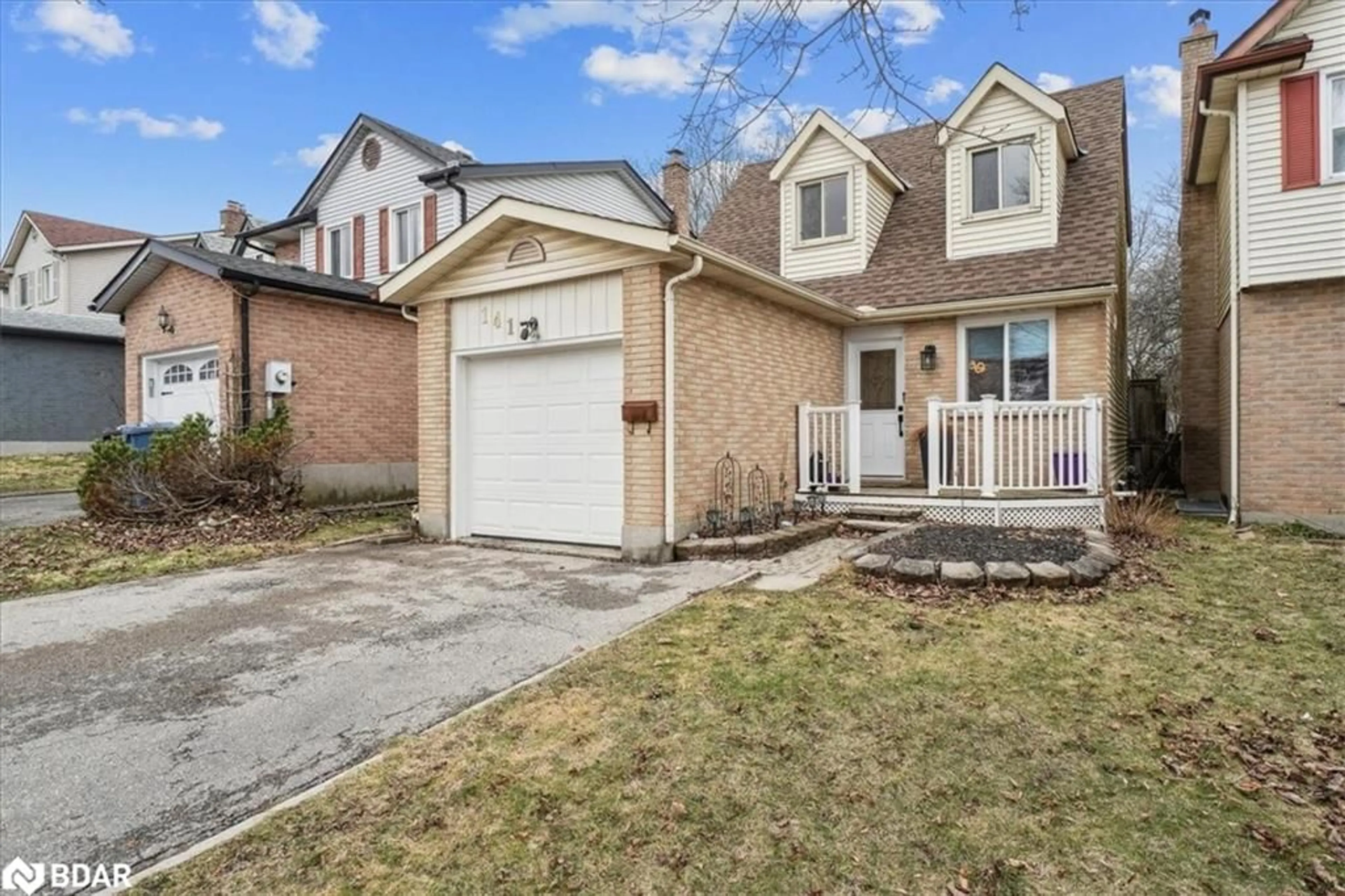 Home with brick exterior material, street for 141 Ironwood Rd, Guelph Ontario N1G 3P5