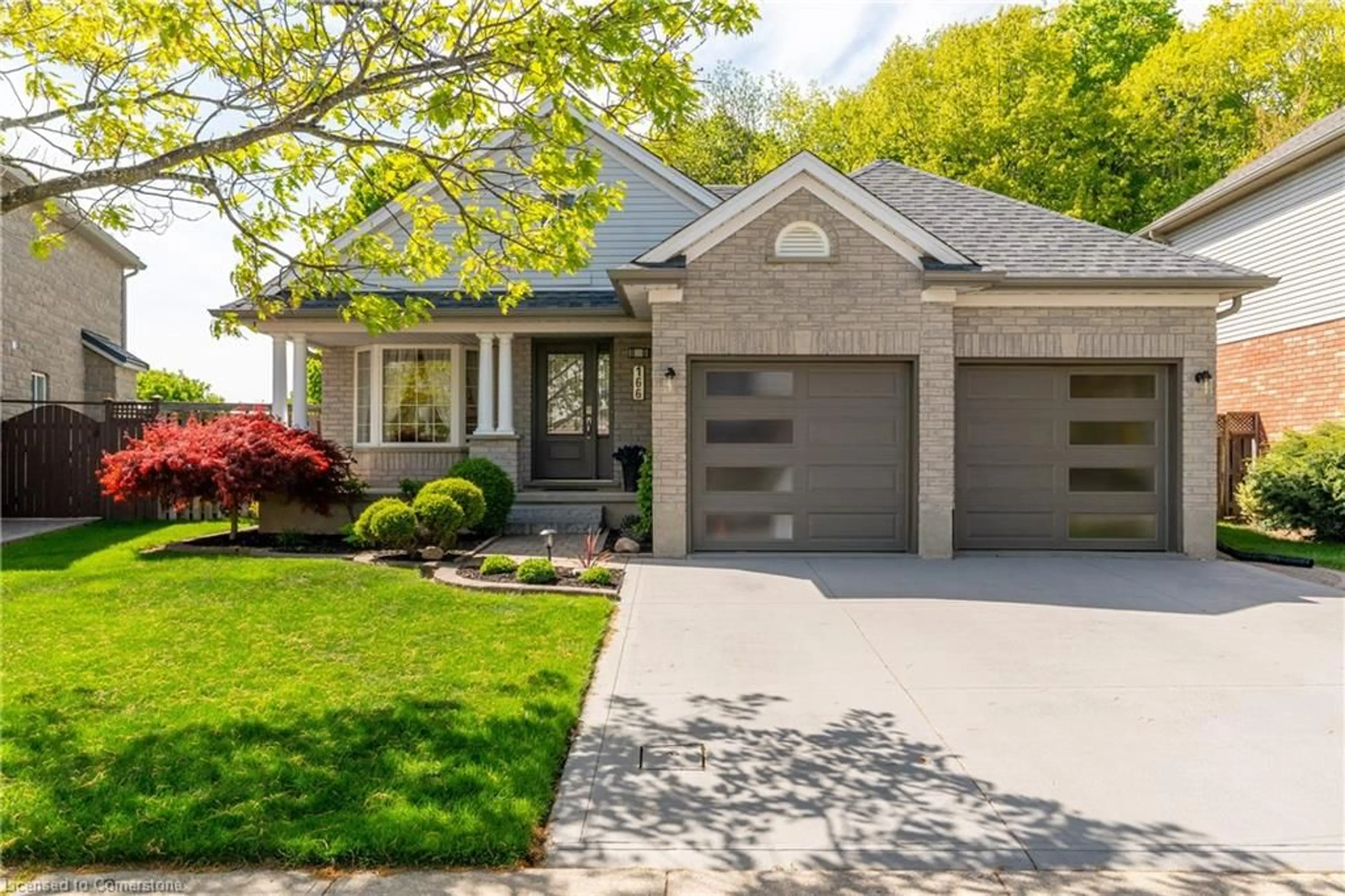 Home with brick exterior material, street for 166 Mcmeeken Dr, Cambridge Ontario N3C 4H2