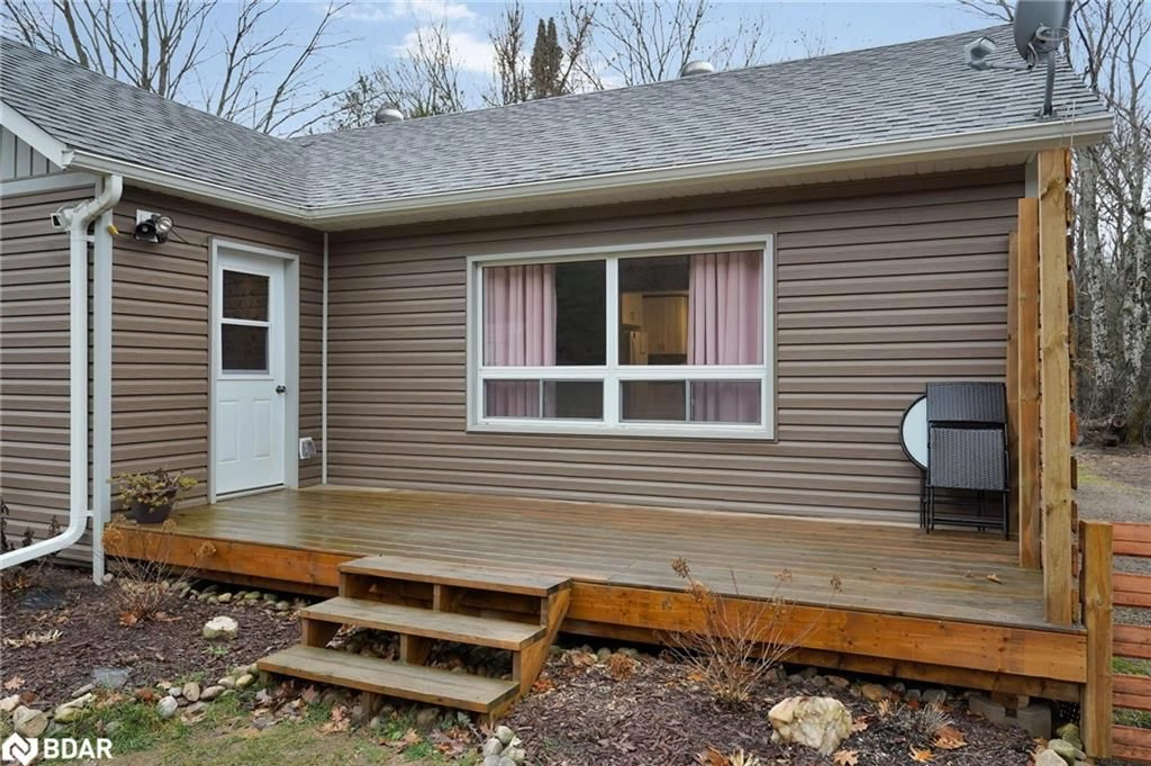 Home with vinyl exterior material, street for 13045 Highway 35 Hwy, Minden Ontario K0M 2K0