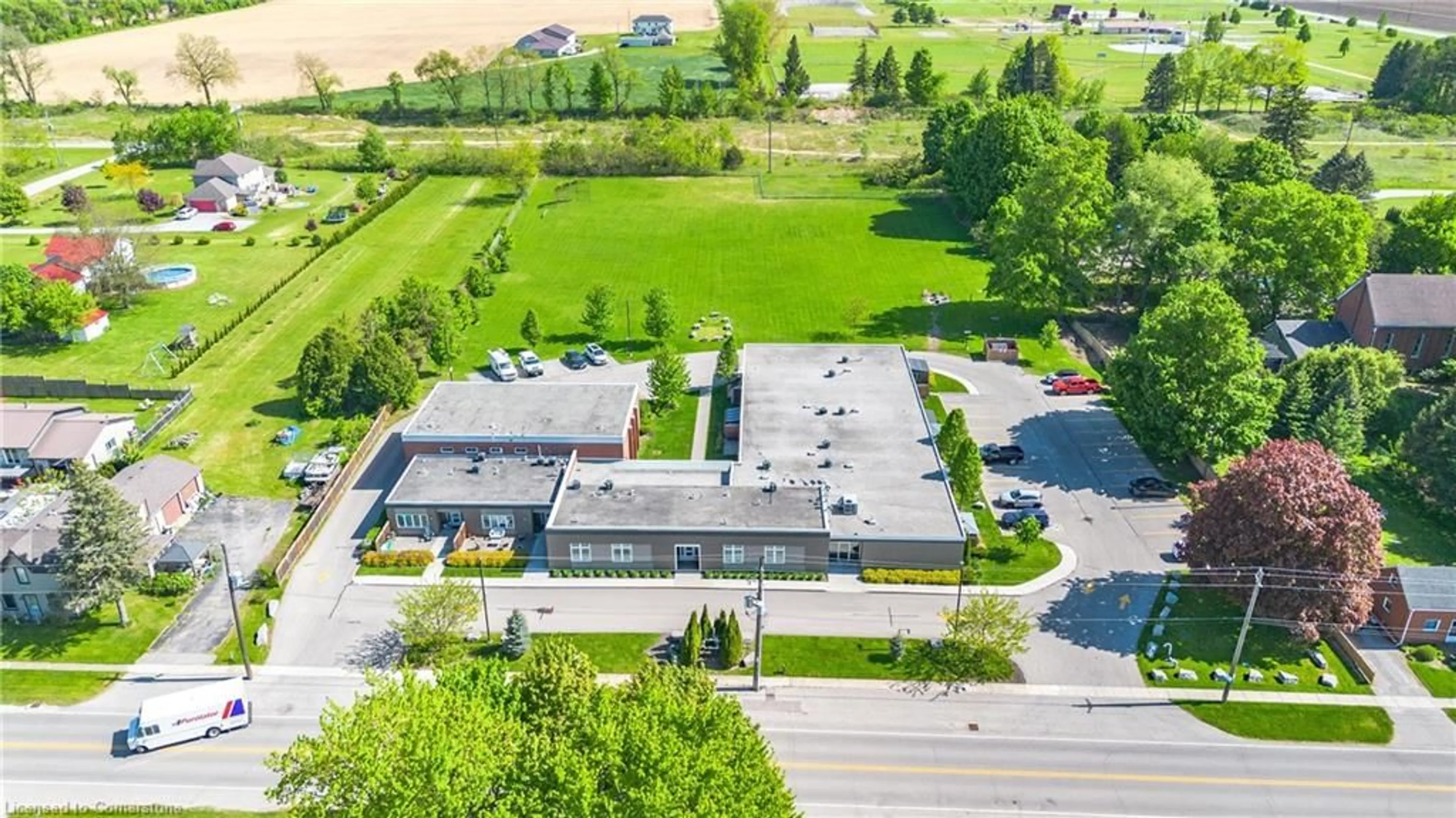 A pic from outside/outdoor area/front of a property/back of a property/a pic from drone, water/lake/river/ocean view for 992 Windham Centre Rd #7, Windham Centre Ontario N0E 2A0