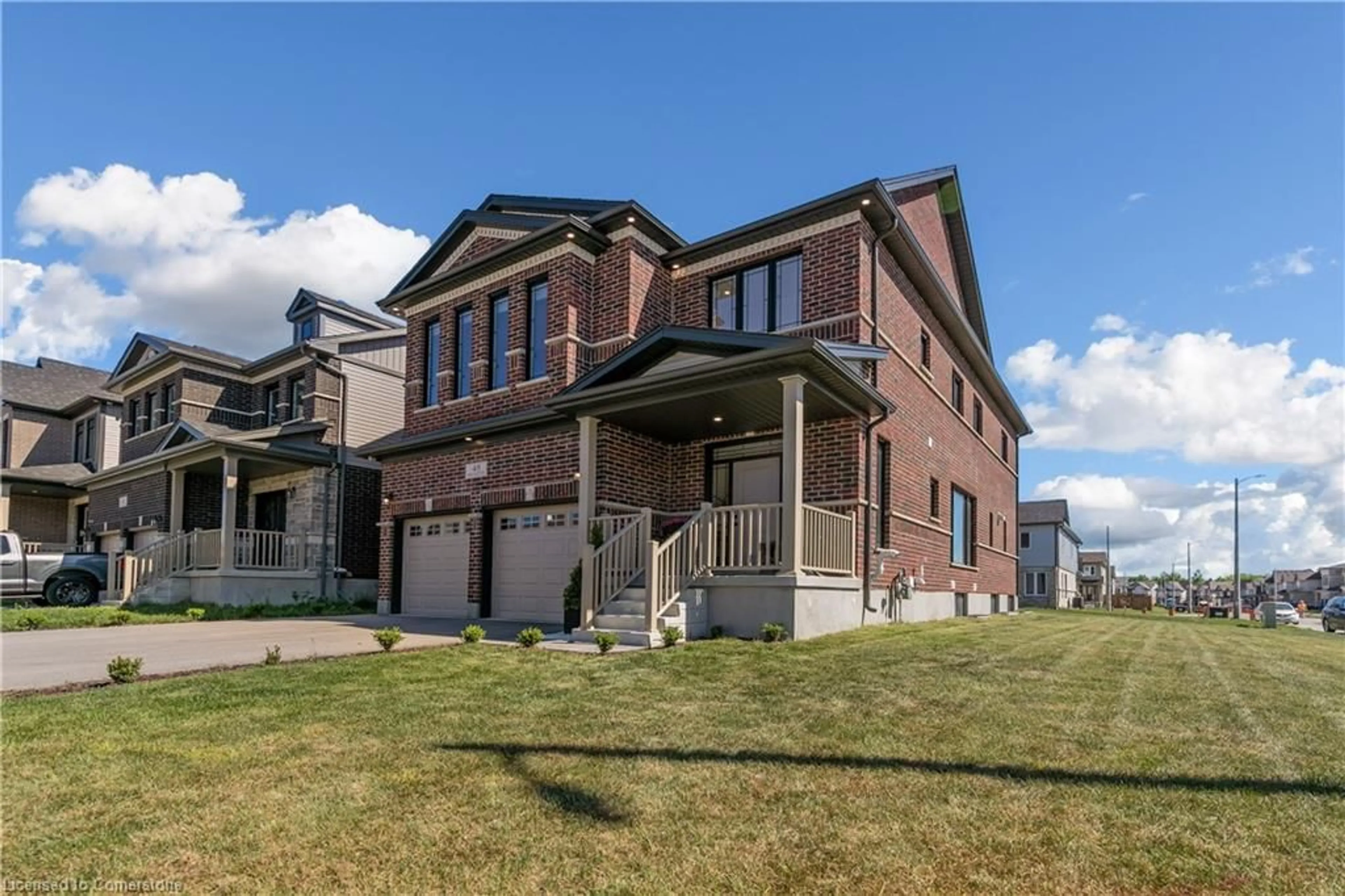 Home with brick exterior material, street for 48 Macalister Blvd, Guelph Ontario N1G 0G6