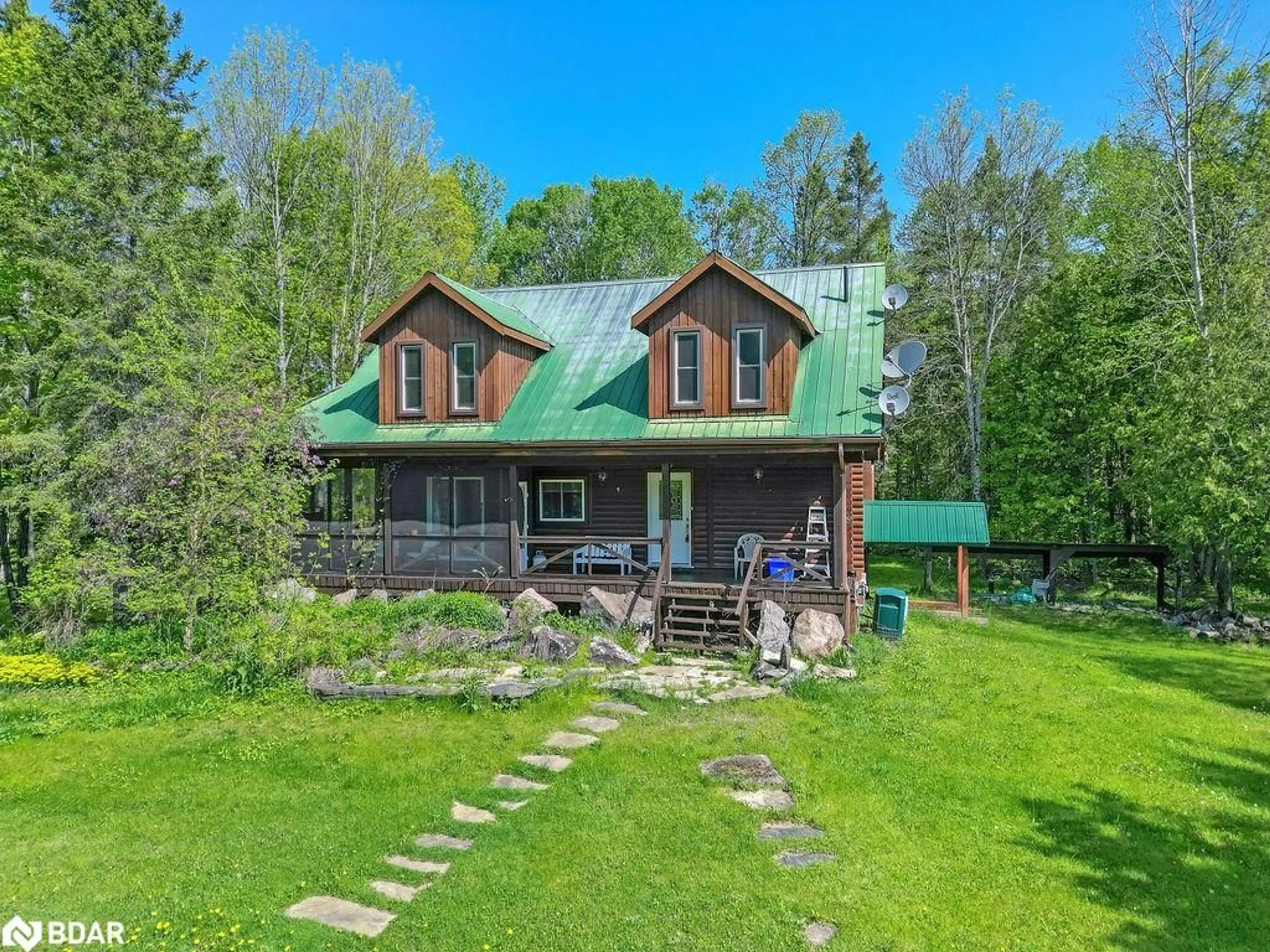 A pic from outside/outdoor area/front of a property/back of a property/a pic from drone, unknown for 189 Dartmoor Rd, Kawartha Lakes Ontario L0K 1W0
