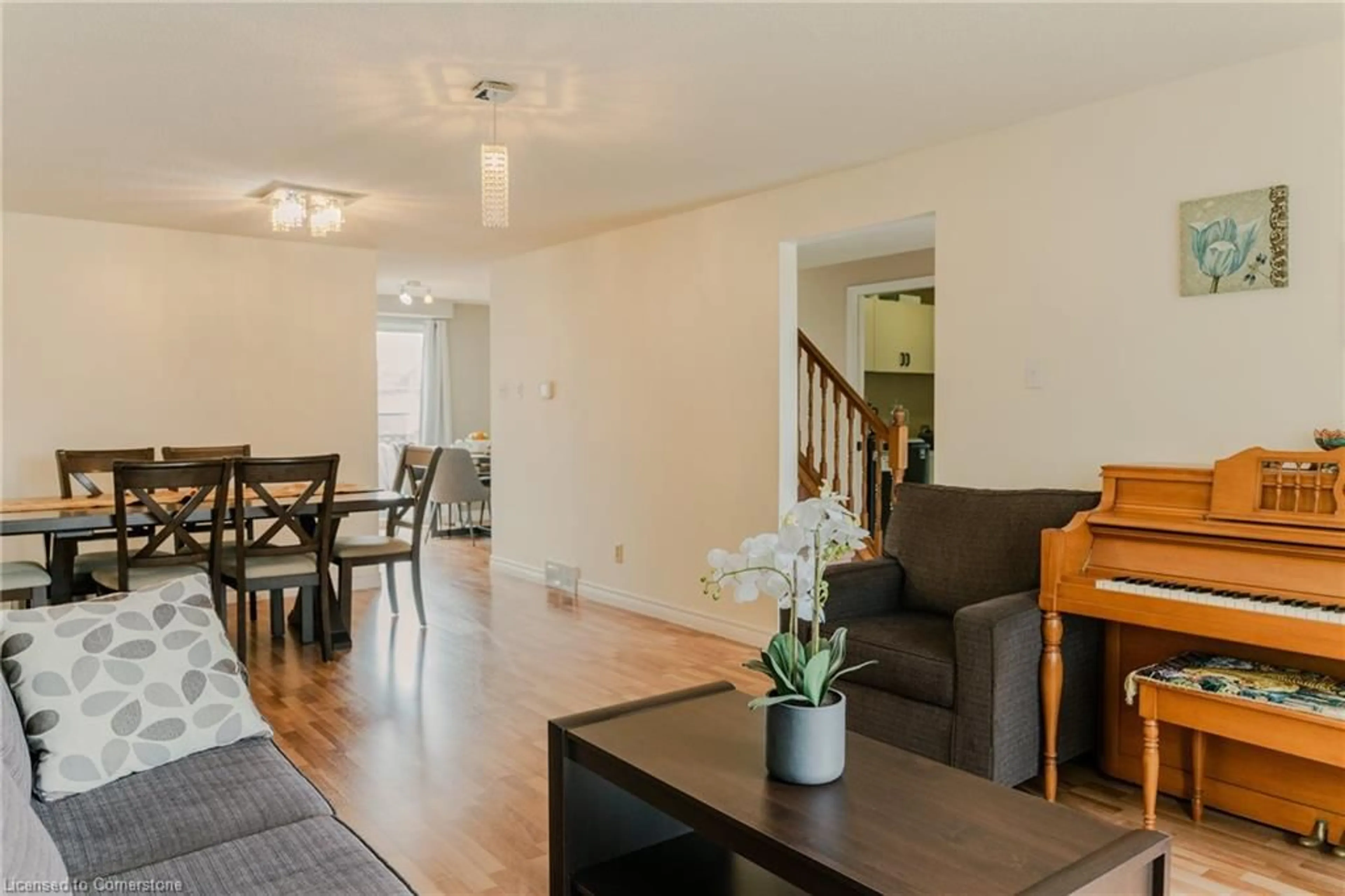 Living room with furniture, wood/laminate floor for 150 Sunrise Pl, Kitchener Ontario N2B 3S9