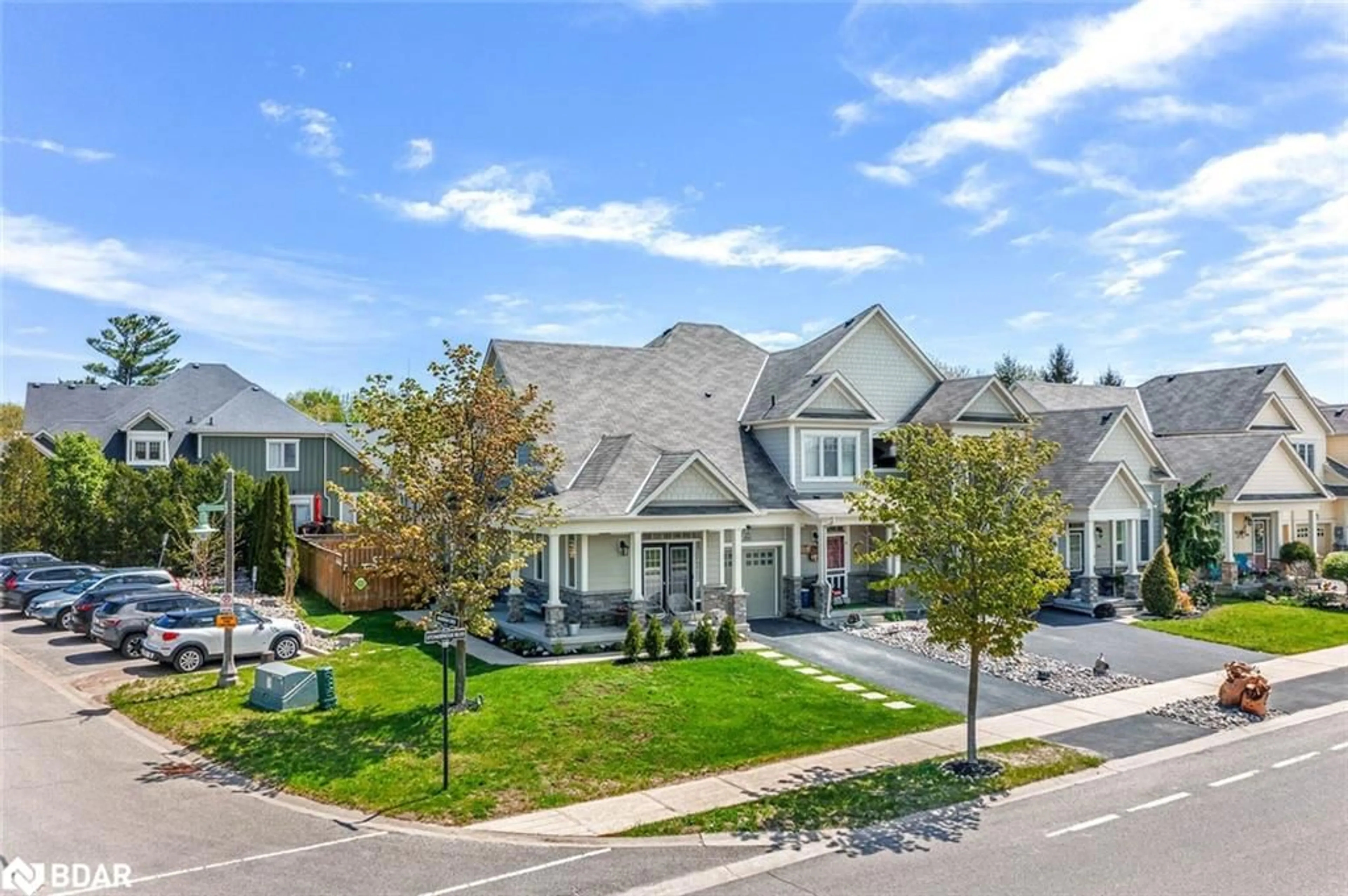 A pic from outside/outdoor area/front of a property/back of a property/a pic from drone, street for 300 Stonebridge Boulevard, Wasaga Beach Ontario L9Z 0E7