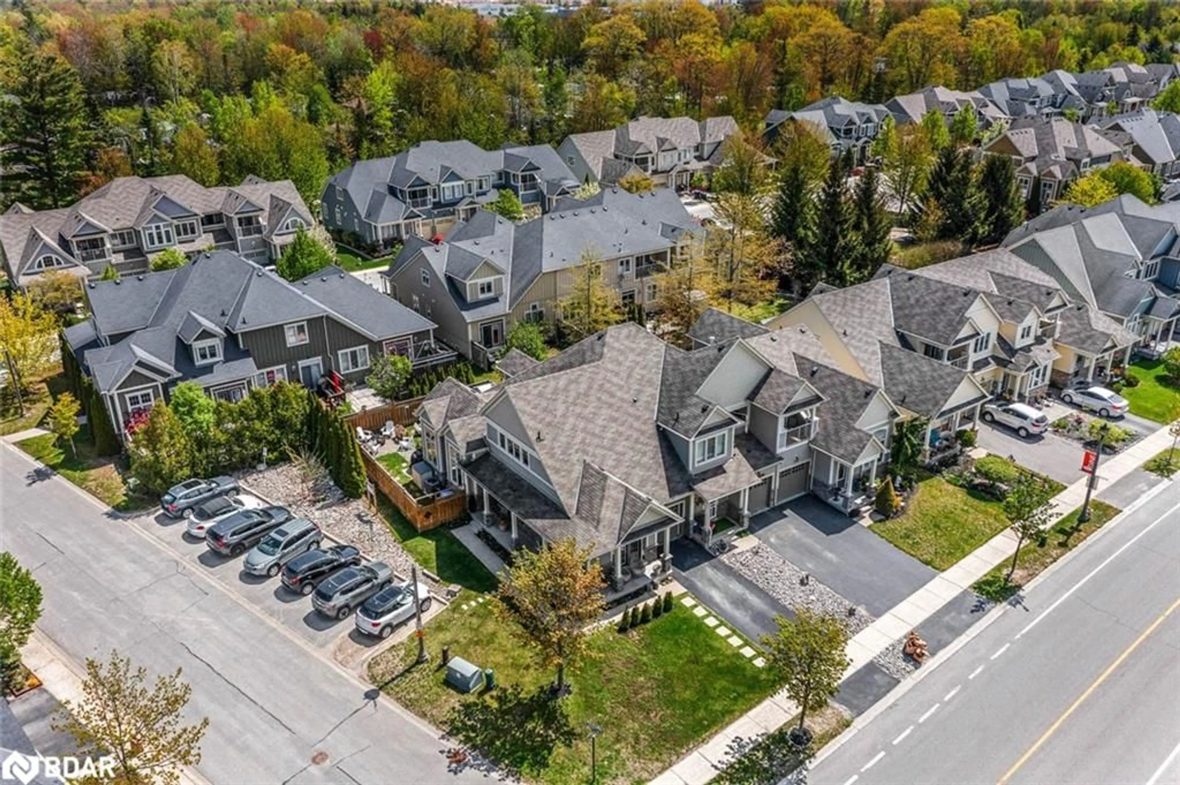 A pic from outside/outdoor area/front of a property/back of a property/a pic from drone, street for 300 Stonebridge Boulevard, Wasaga Beach Ontario L9Z 0E7