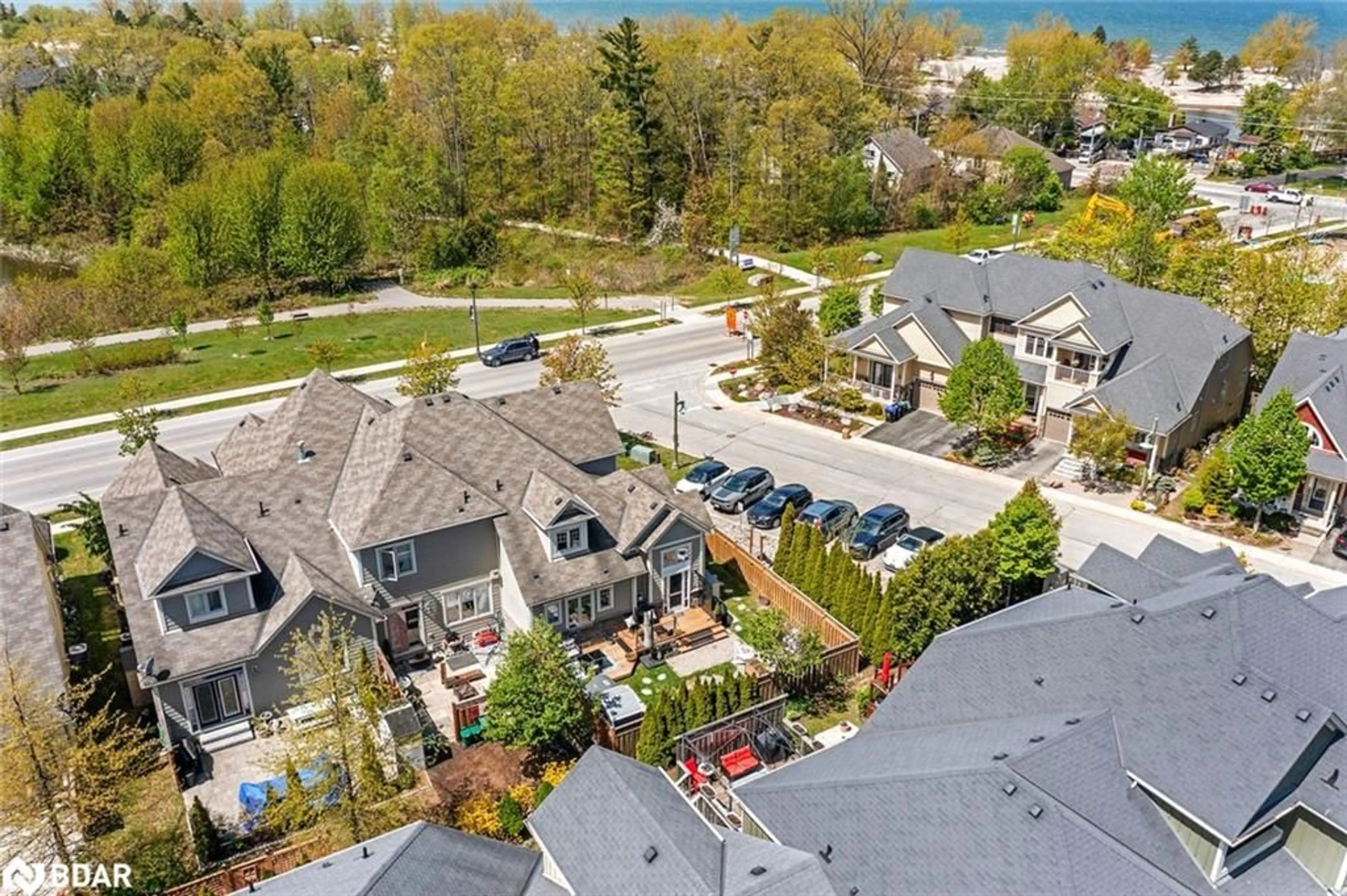 A pic from outside/outdoor area/front of a property/back of a property/a pic from drone, water/lake/river/ocean view for 300 Stonebridge Boulevard, Wasaga Beach Ontario L9Z 0E7