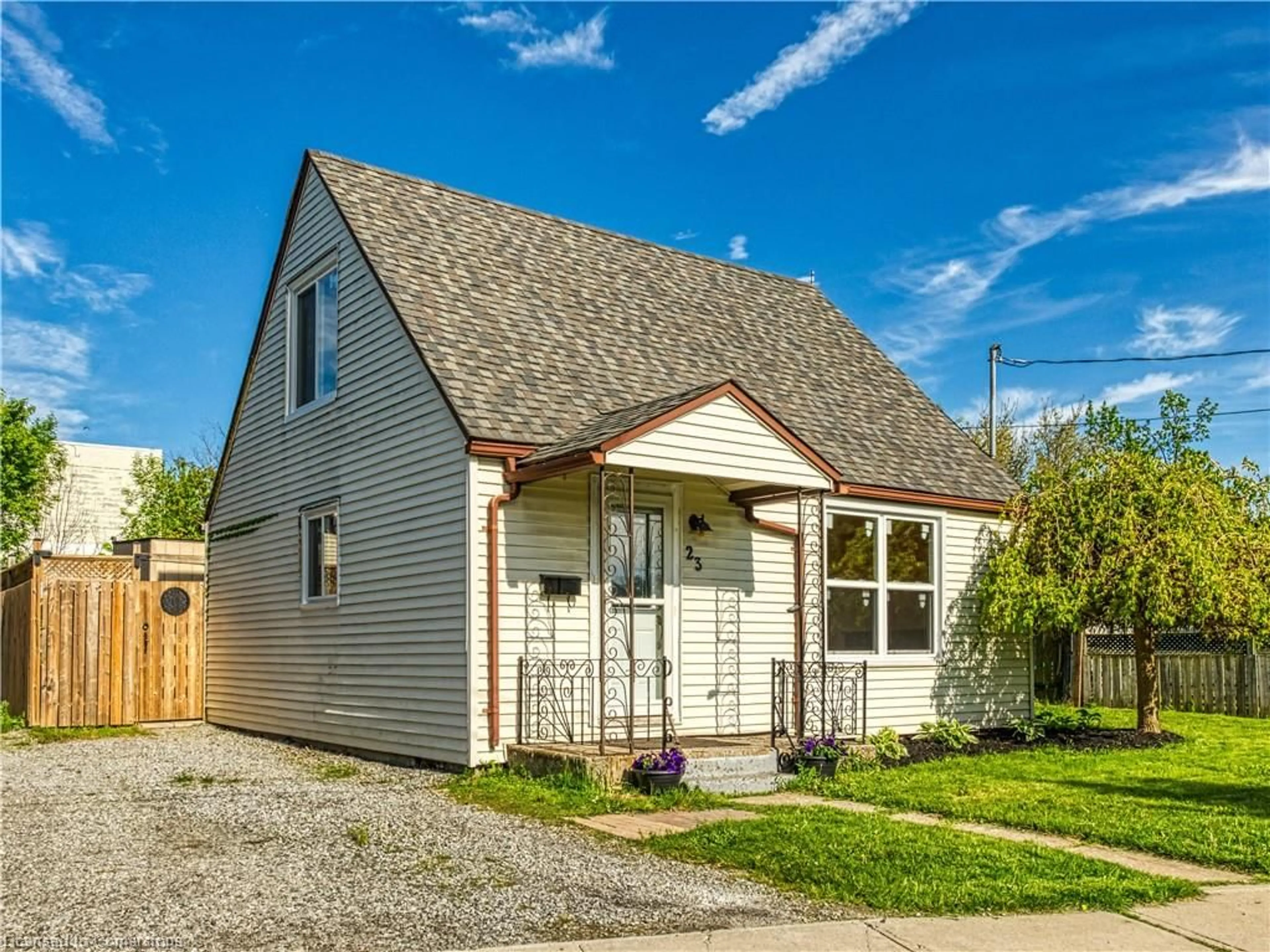 Home with vinyl exterior material, street for 23 Philip St, St. Catharines Ontario L2P 2M7